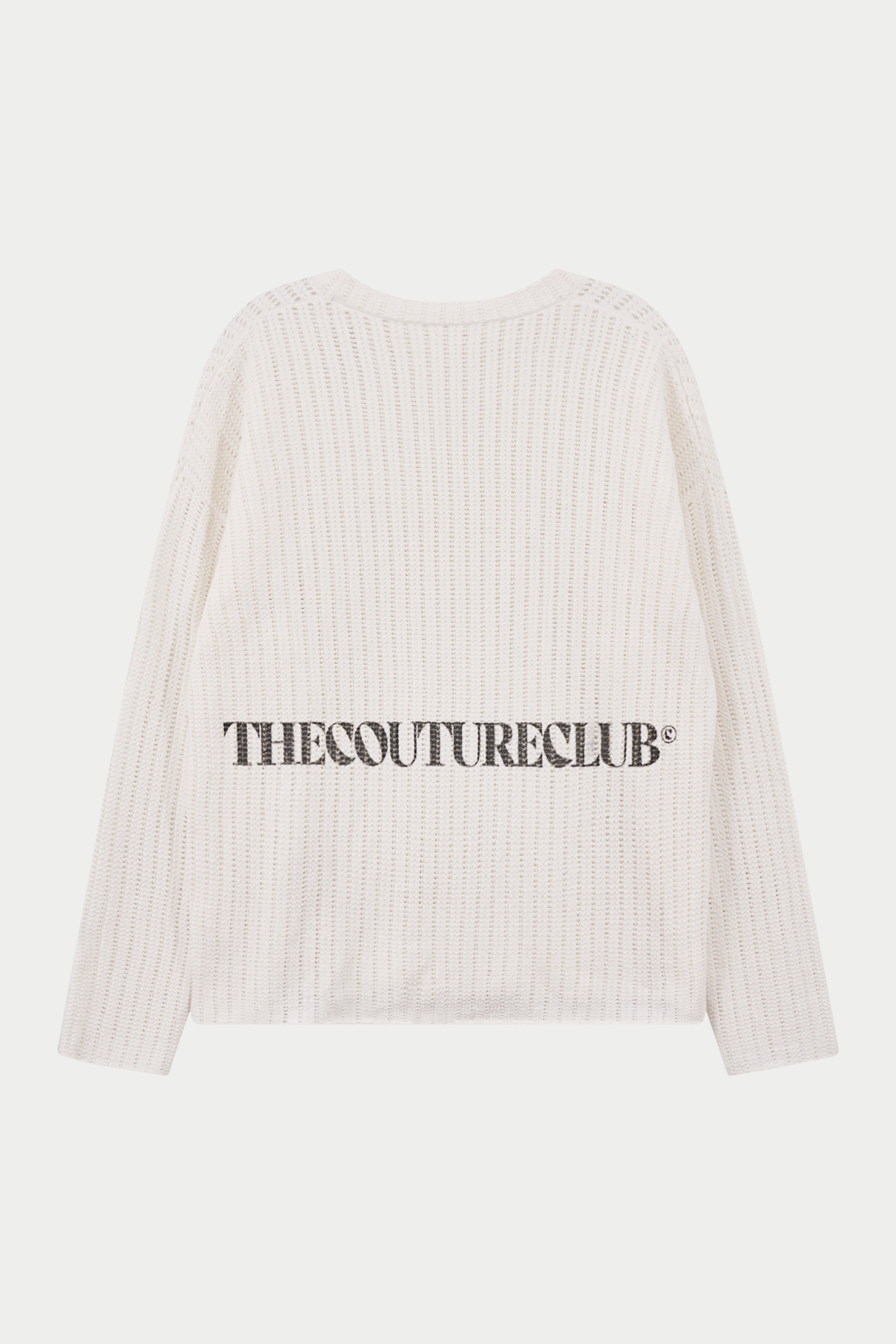 Crochet long sleeved white t-shirt with branding, against a white background.
