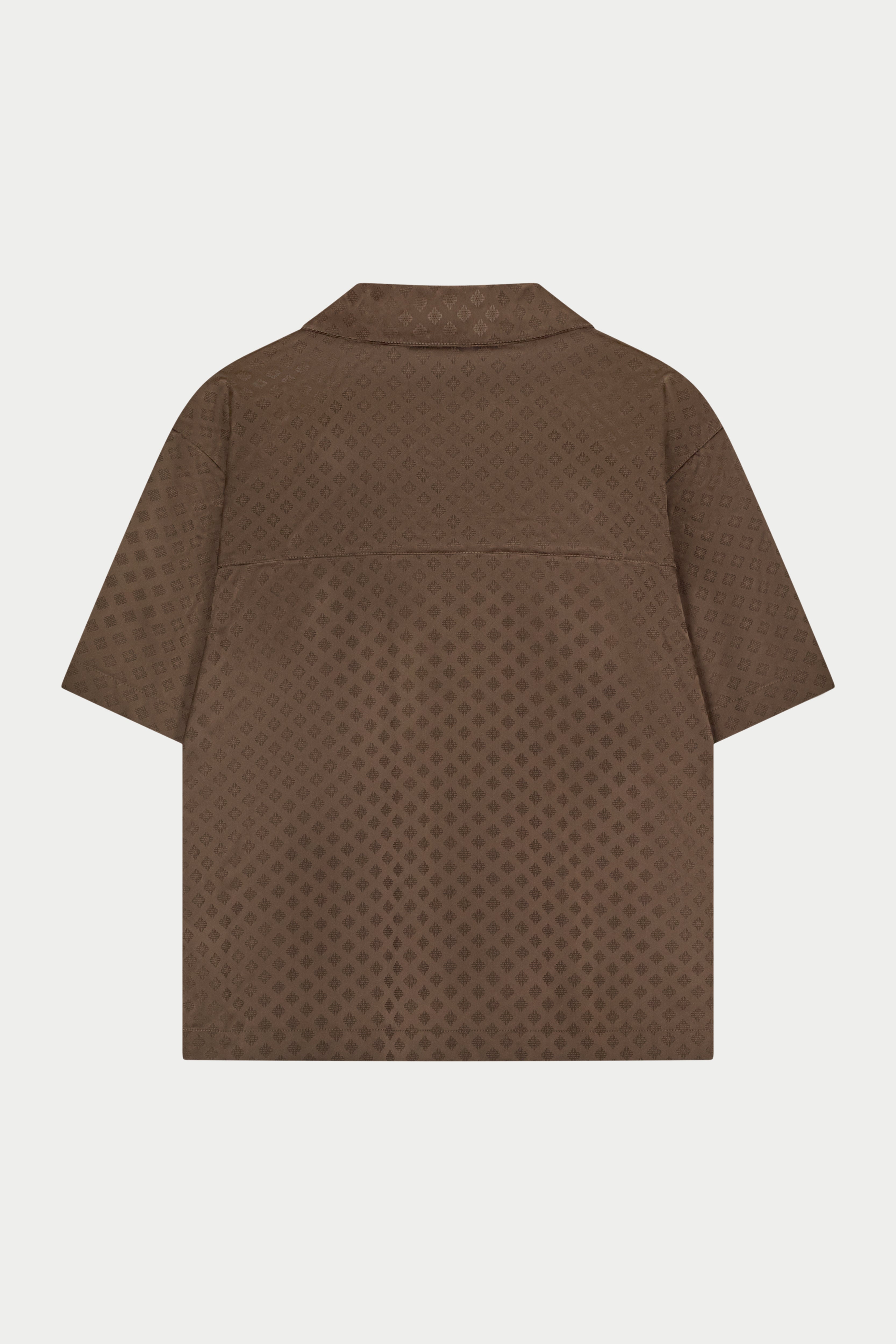 Brown patterned satin shirt on a white background