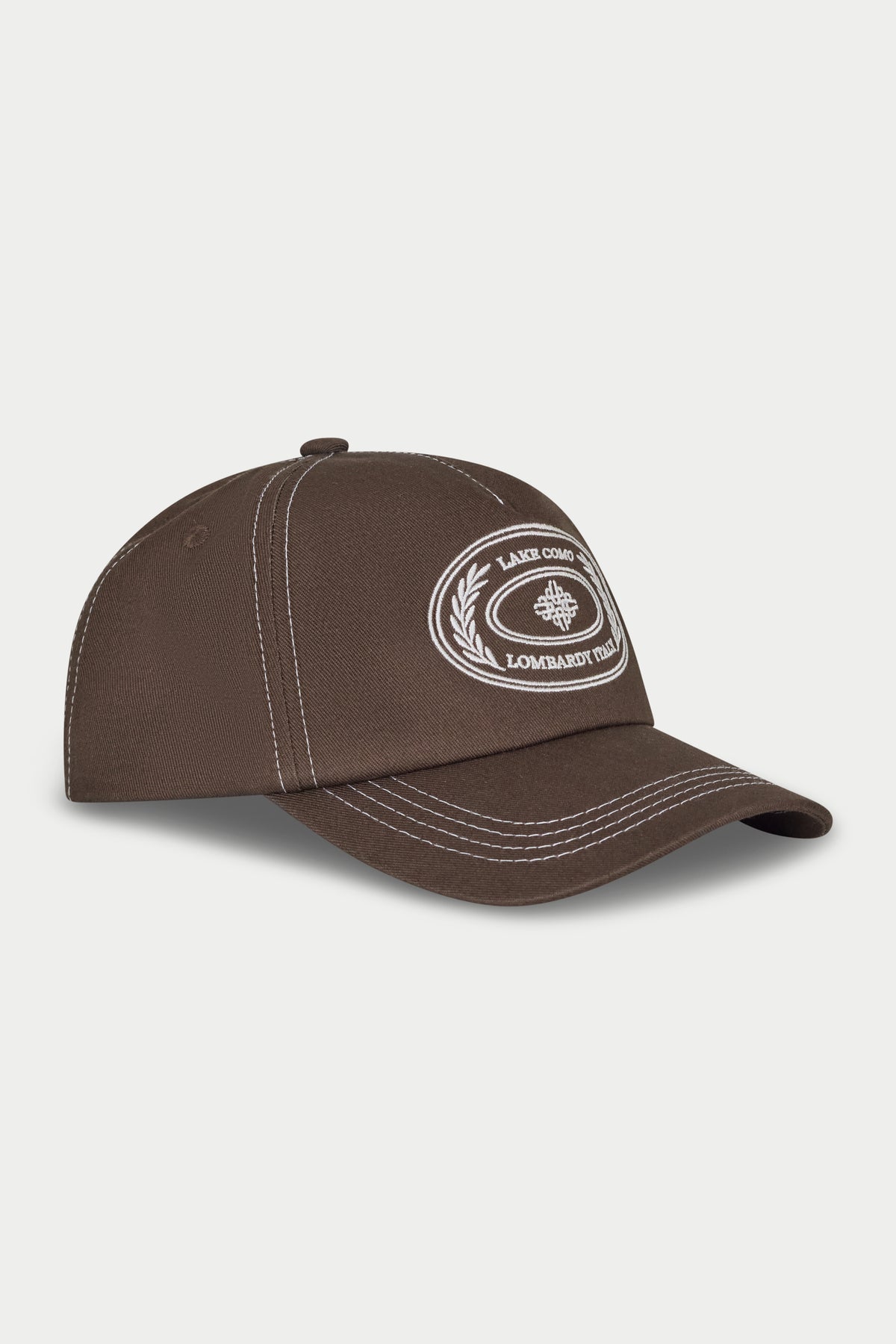 Brown baseball cap with white embroidery on a white background