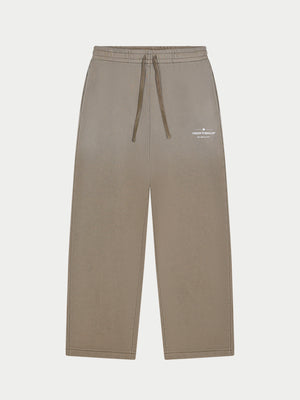 SPRAY WASH COPYRIGHT MULTI GRAPHIC JOGGERS - BEIGE