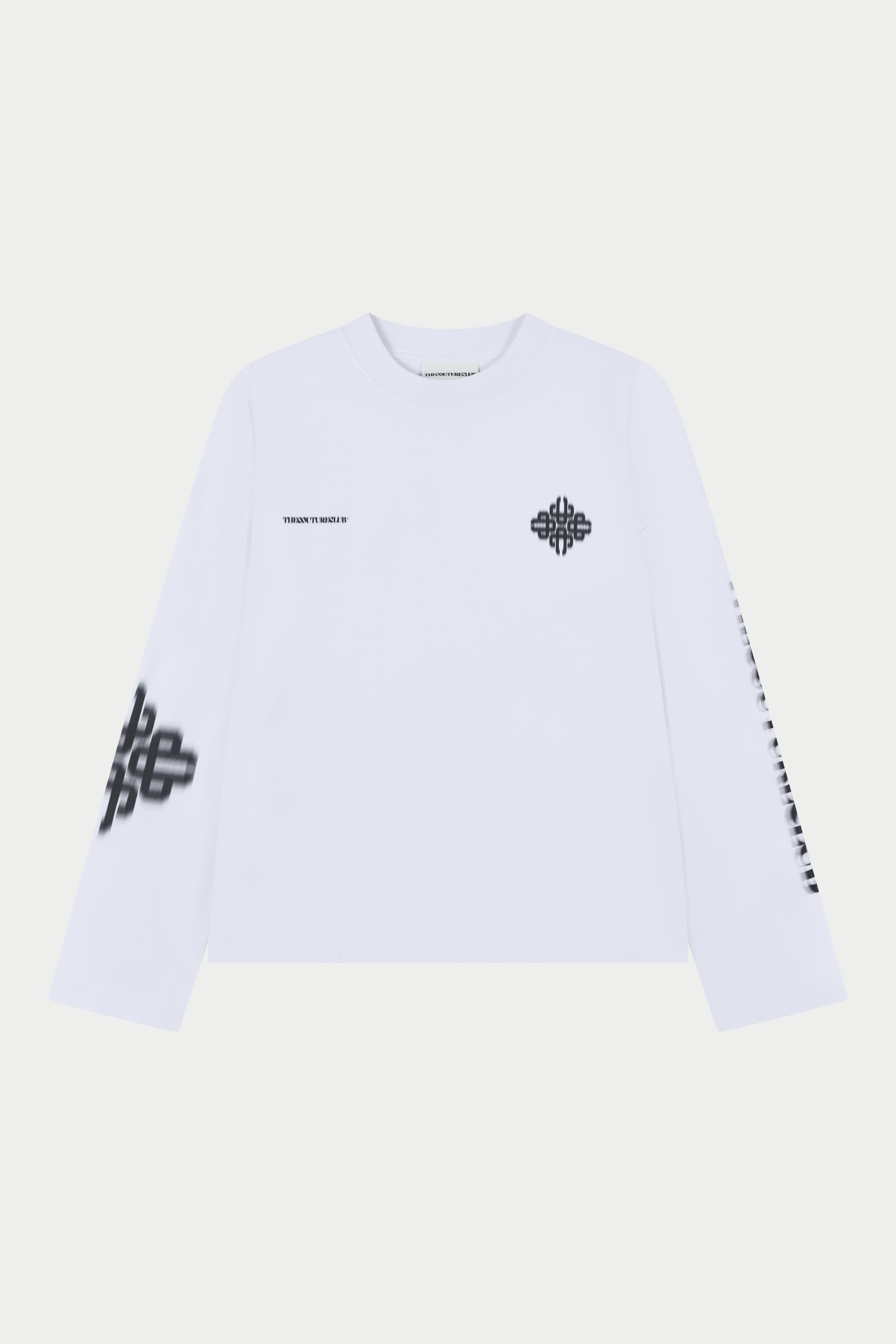 White long sleeved t-shirt with black geometric designs on a light grey background