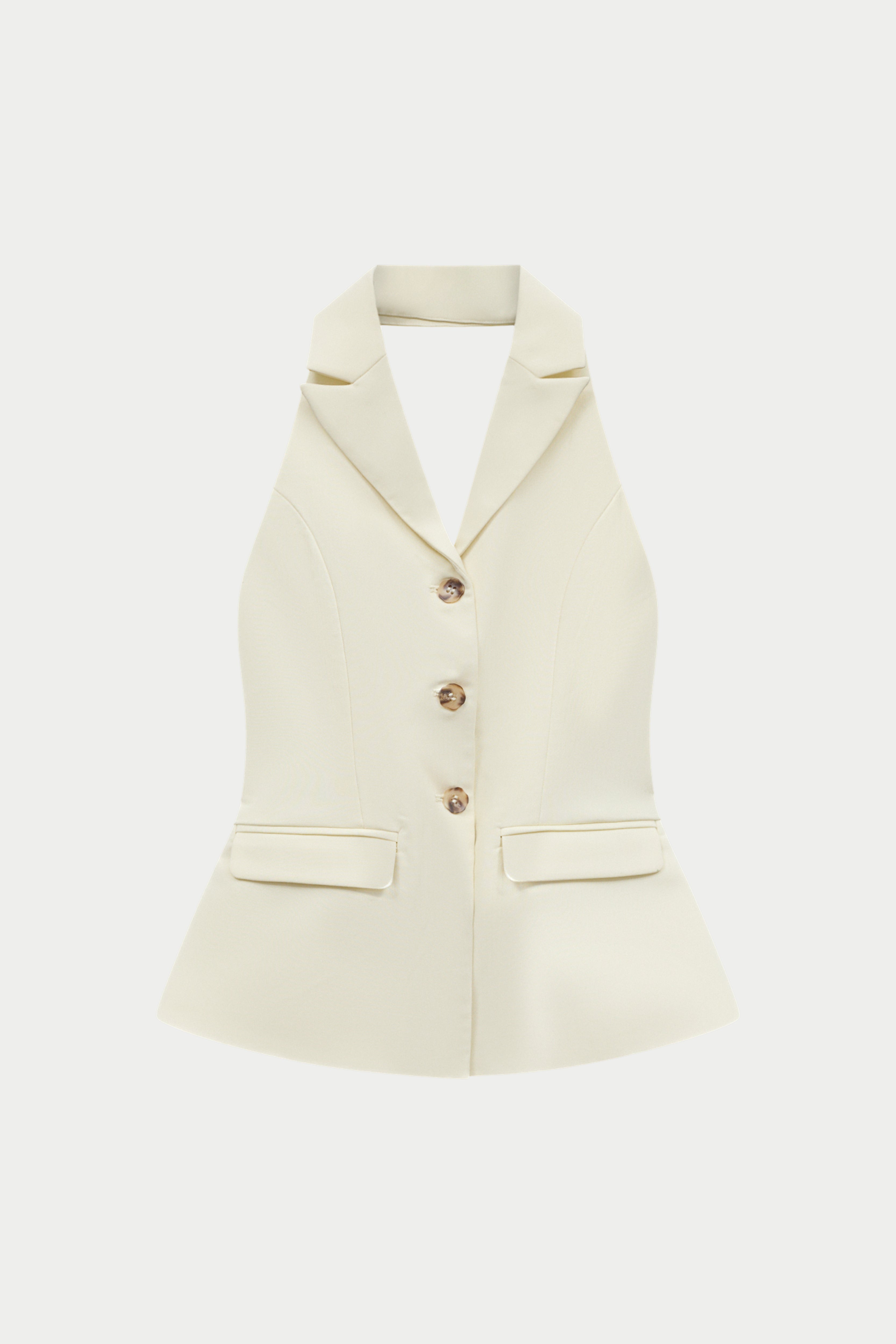 White halter neck blazer with buttons on a white background
