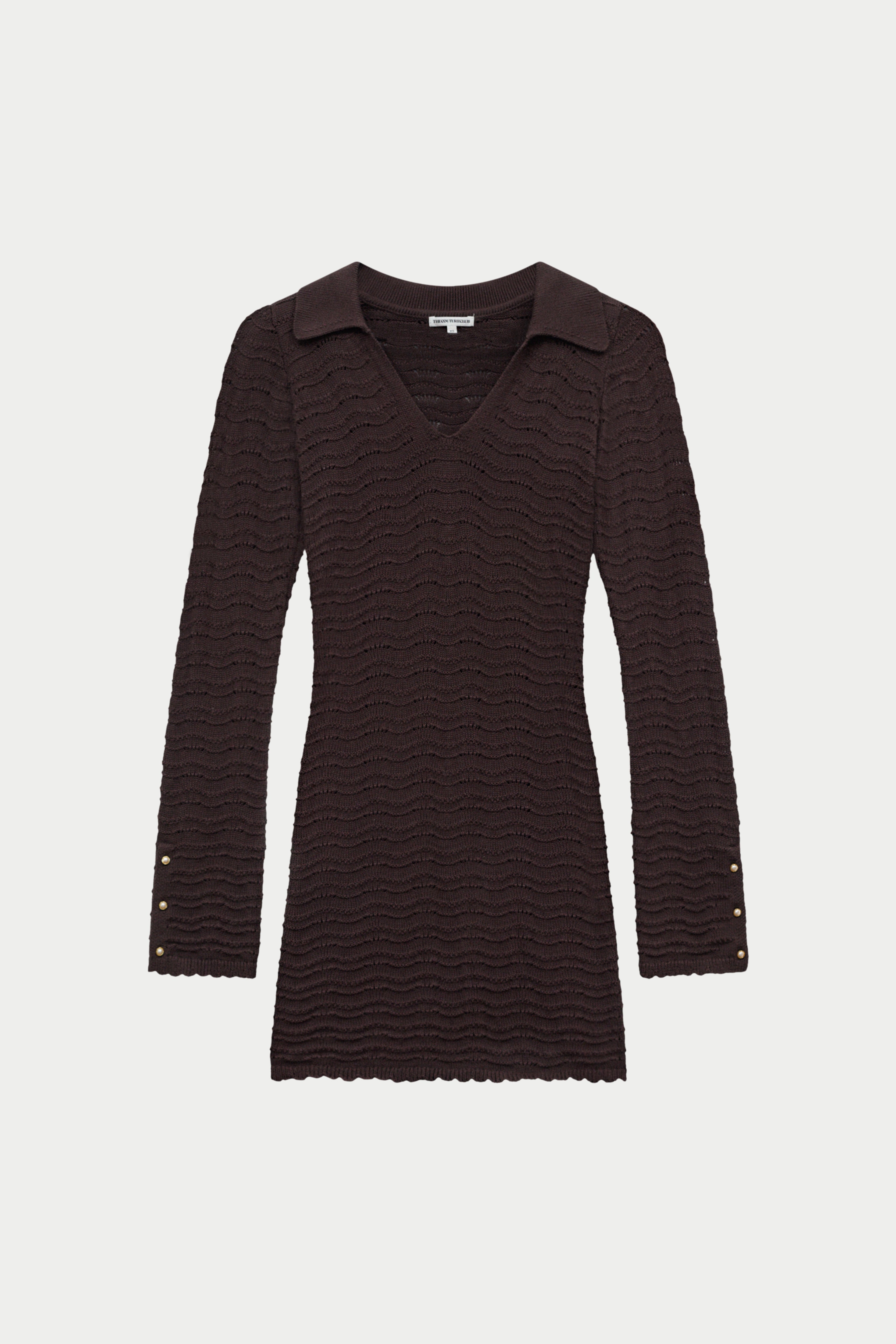 Dark brown long-sleeved crochet knitted mini dress on a white background.