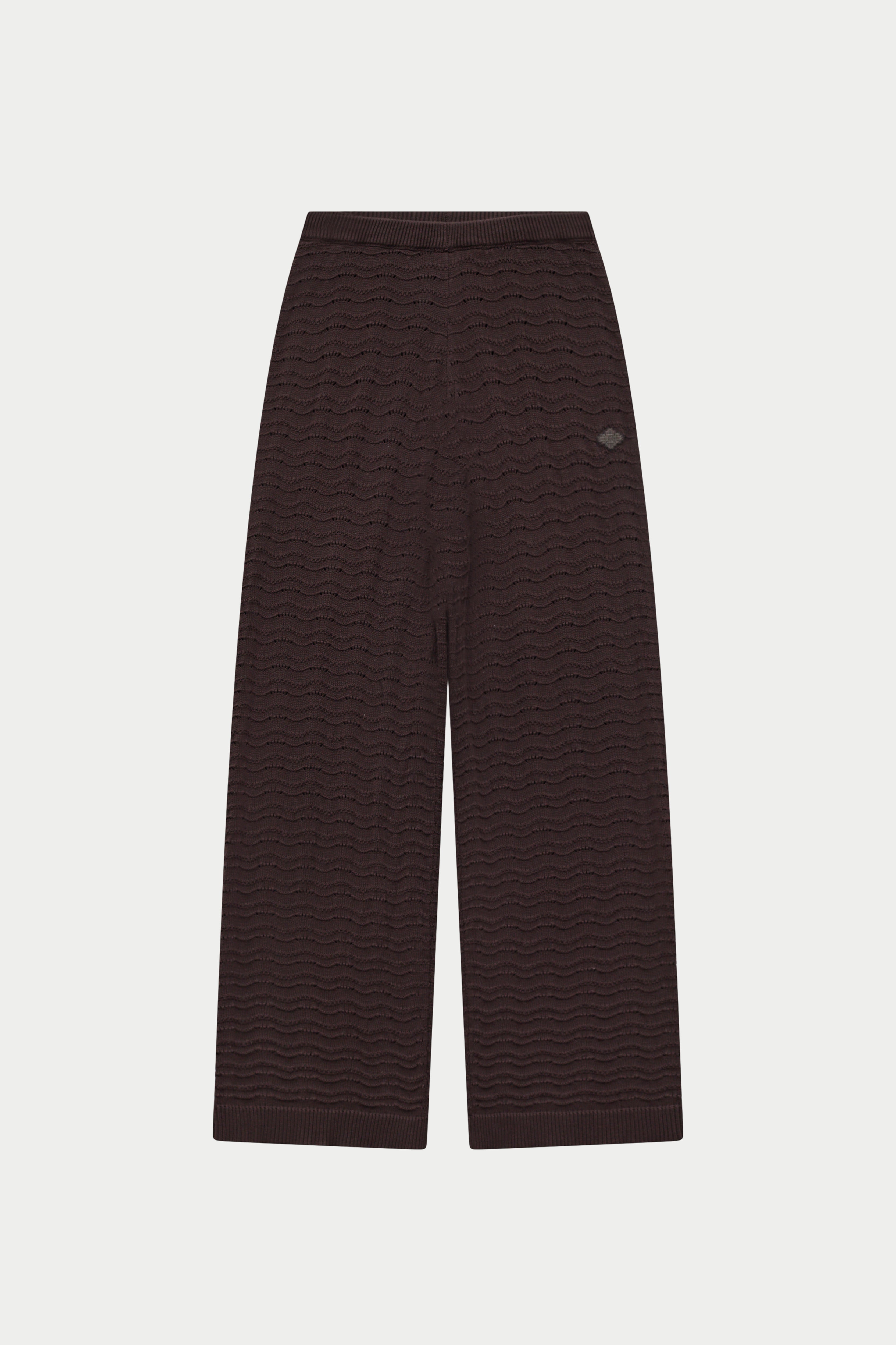 Dark brown crochet knit pants on a white background
