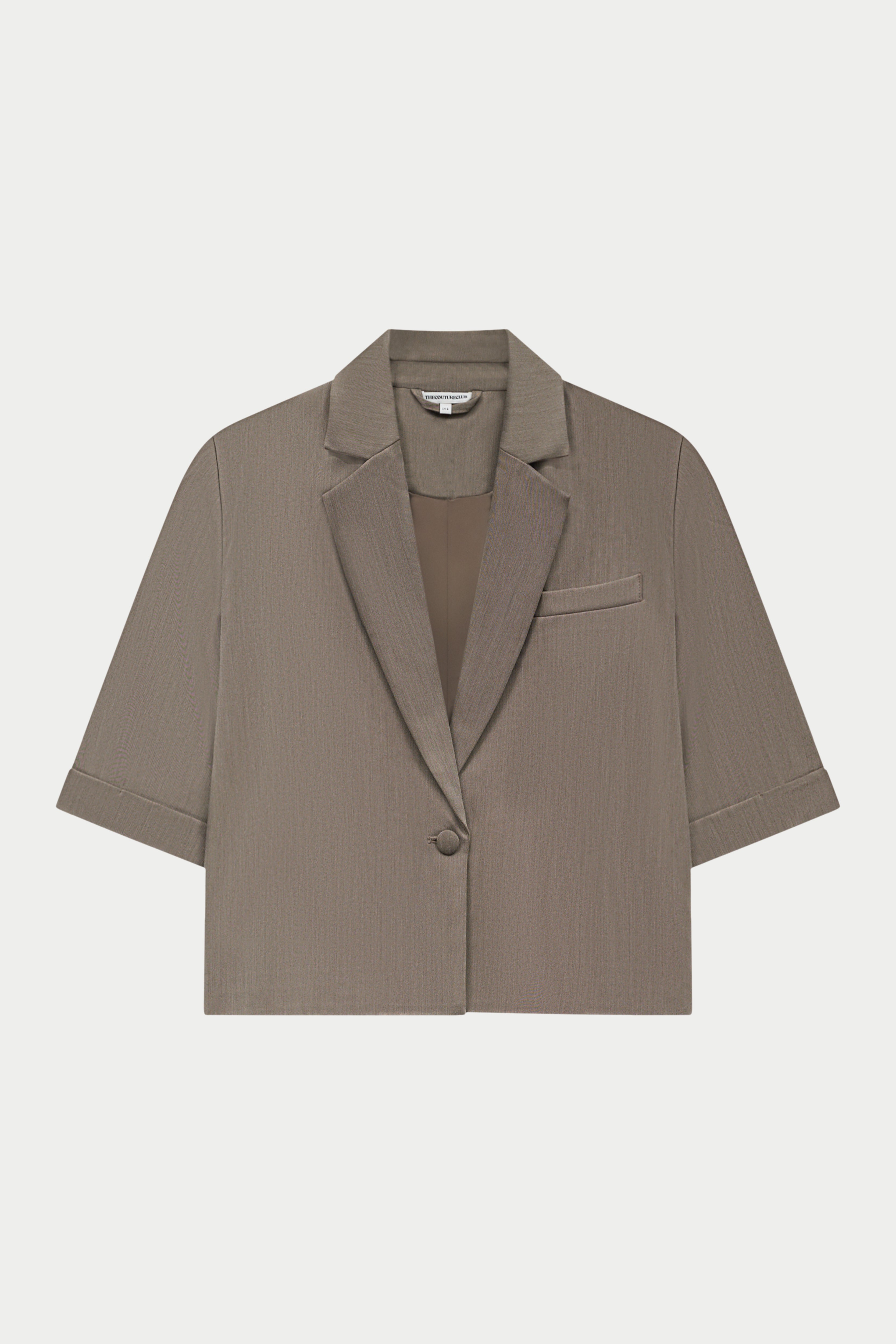 Beige blazer on a white background