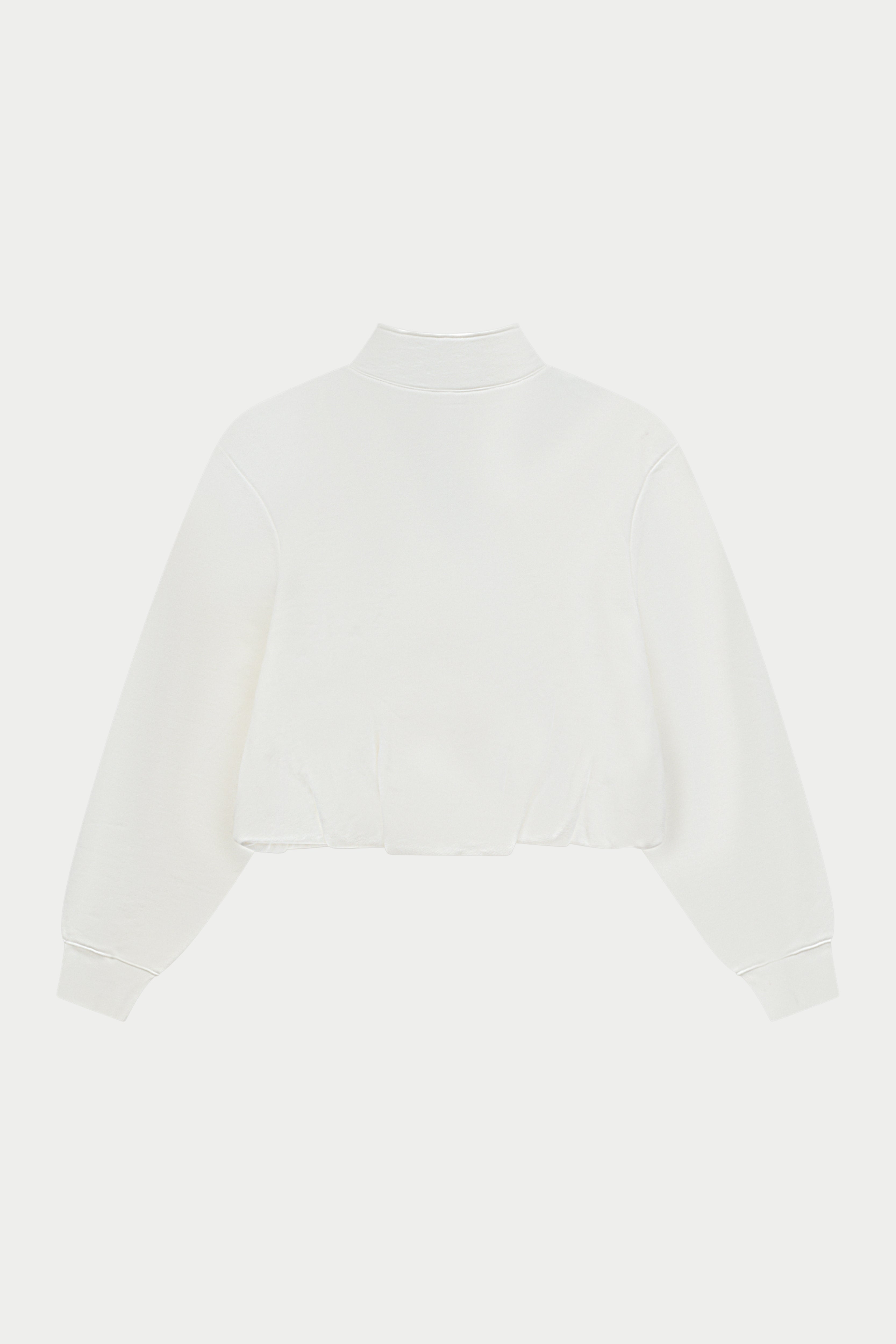 Off white funnel neck zip through hoodie on a white background