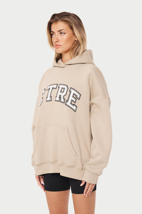 https://www.thecoutureclub.com/products/ctre-varsity-oversized-hoodie-beige