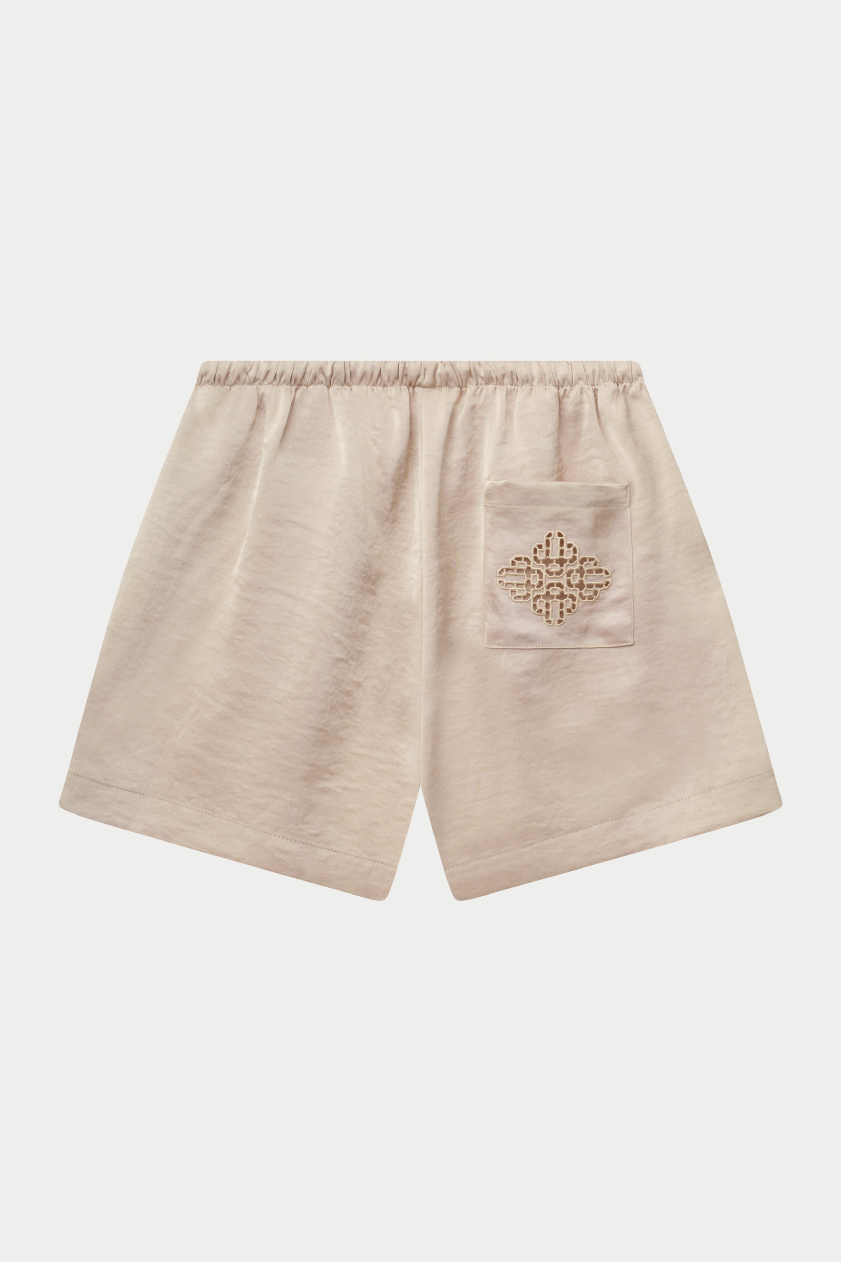 SATIN EMBLEM SHORTS - BEIGE – The Couture Club