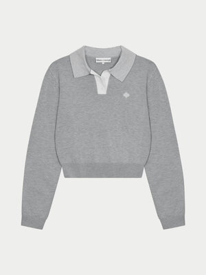 Grey long sleeved polo top with collar on a white background