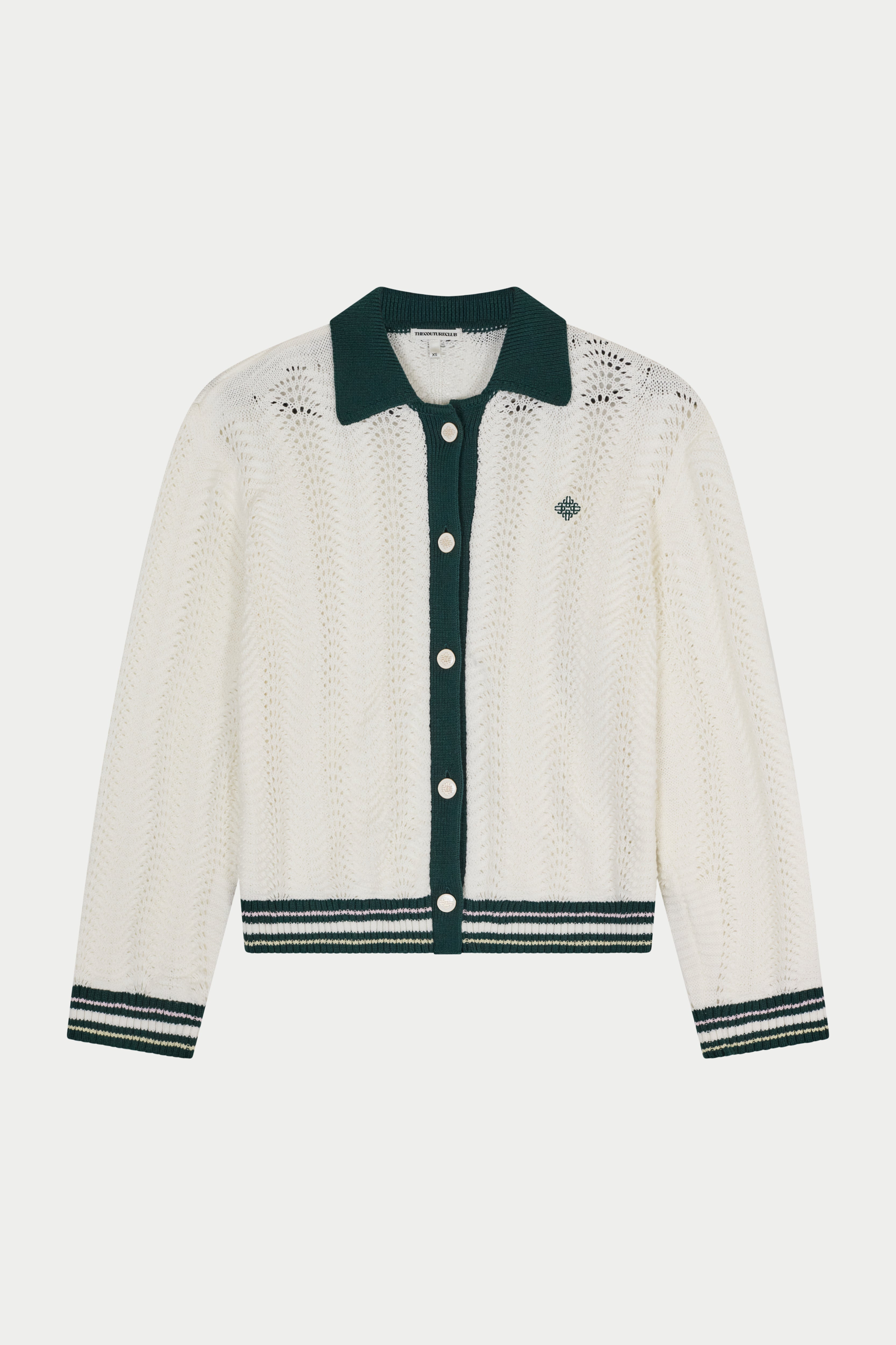 White cardigan with green trim on a white background