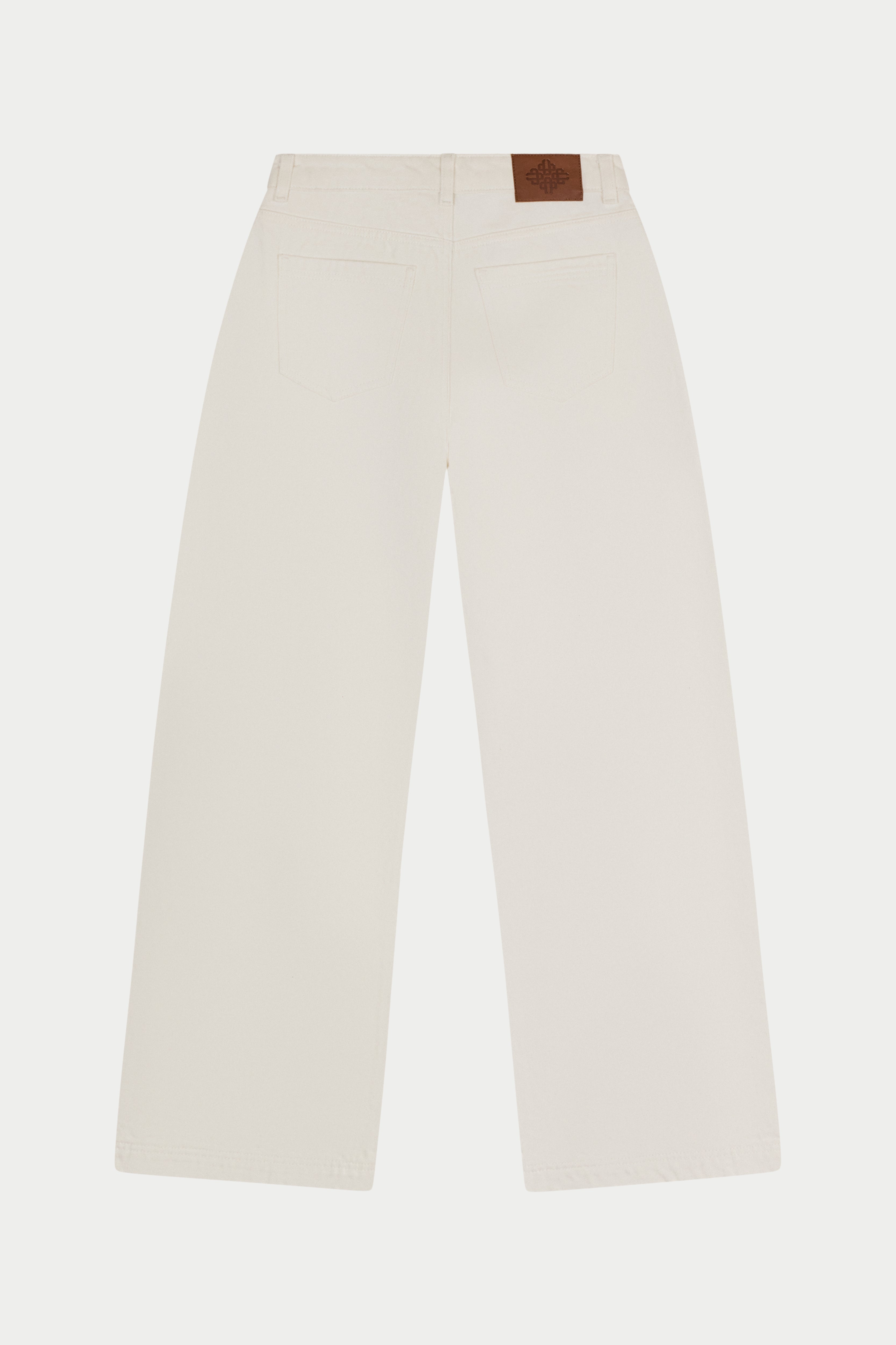 White pants with a brown patch