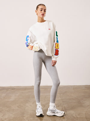 MULTIBADGED CHENILLE RELAXED SWEATSHIRT - OFF WHITE