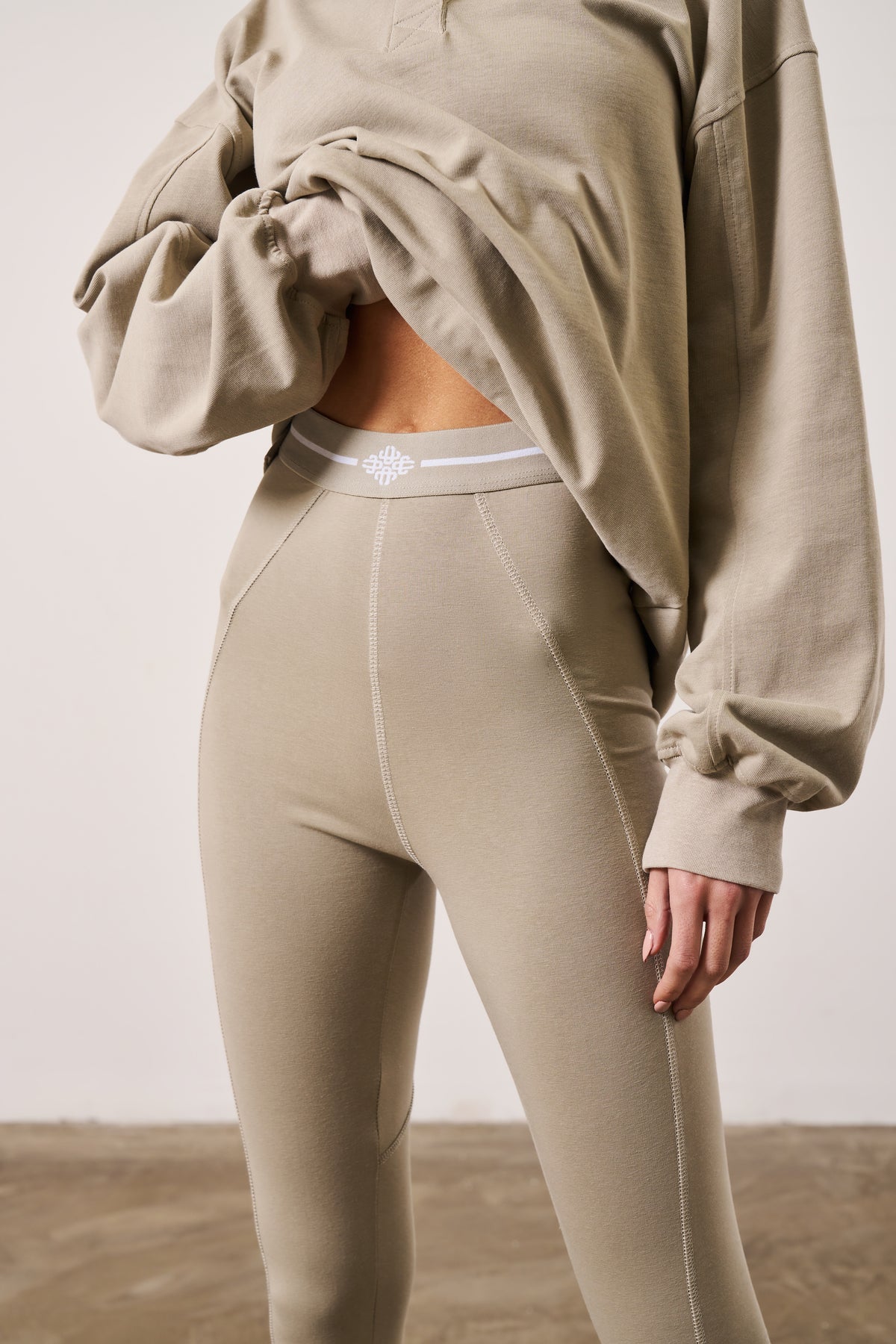 EMBLEM JERSEY LEGGINGS - BEIGE – The Couture Club