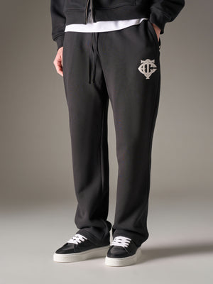 HEAVYWEIGHT MONOGRAM APPLIQUE EMBLEM JOGGERS - BLACK