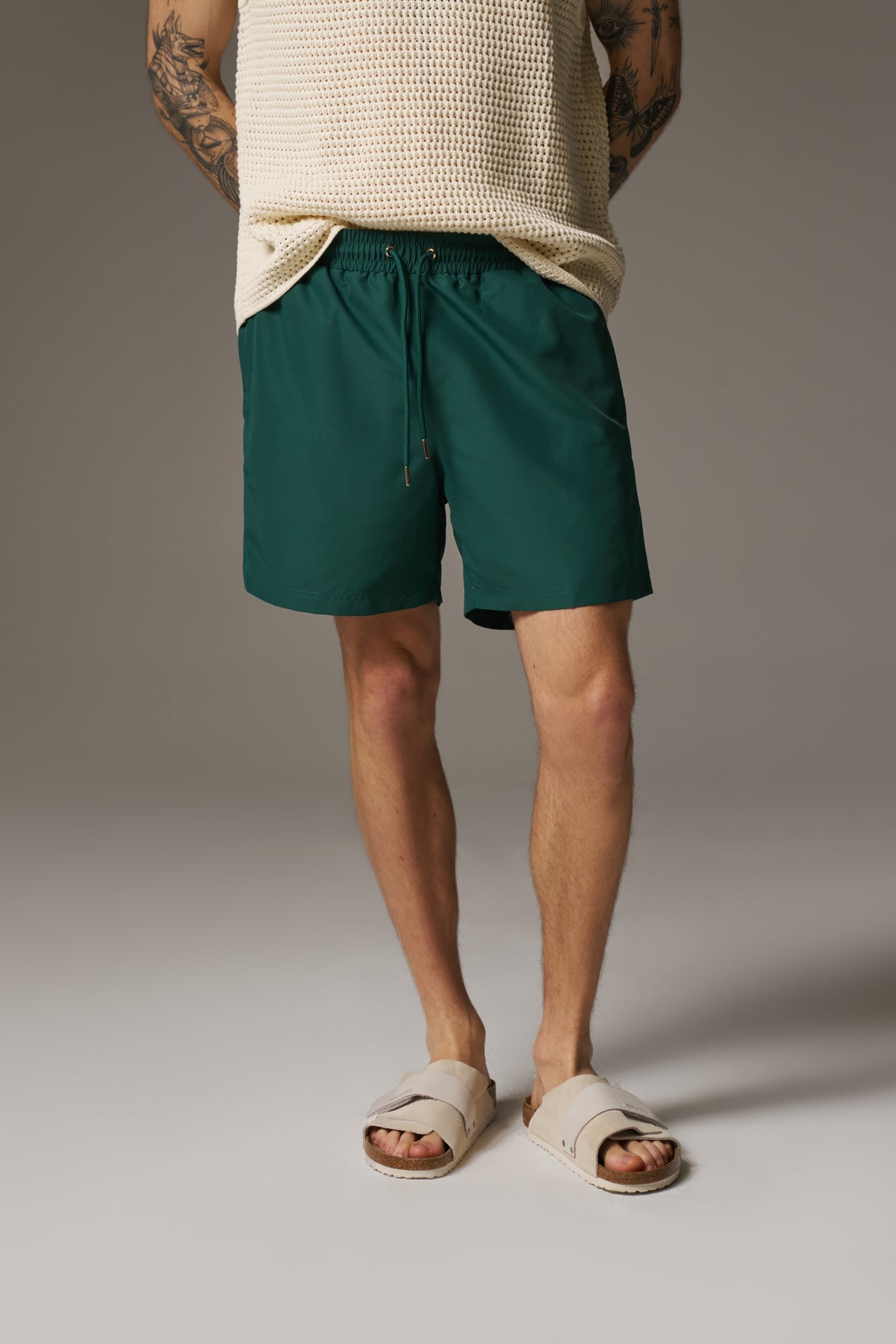 WATER REACTIVE EMBLEM SWIM SHORT - GREEN