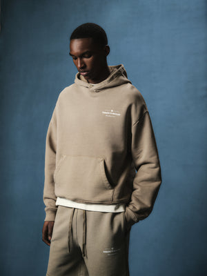 SPRAY WASH COPYRIGHT MULTI GRAPHIC HOODIE - BEIGE