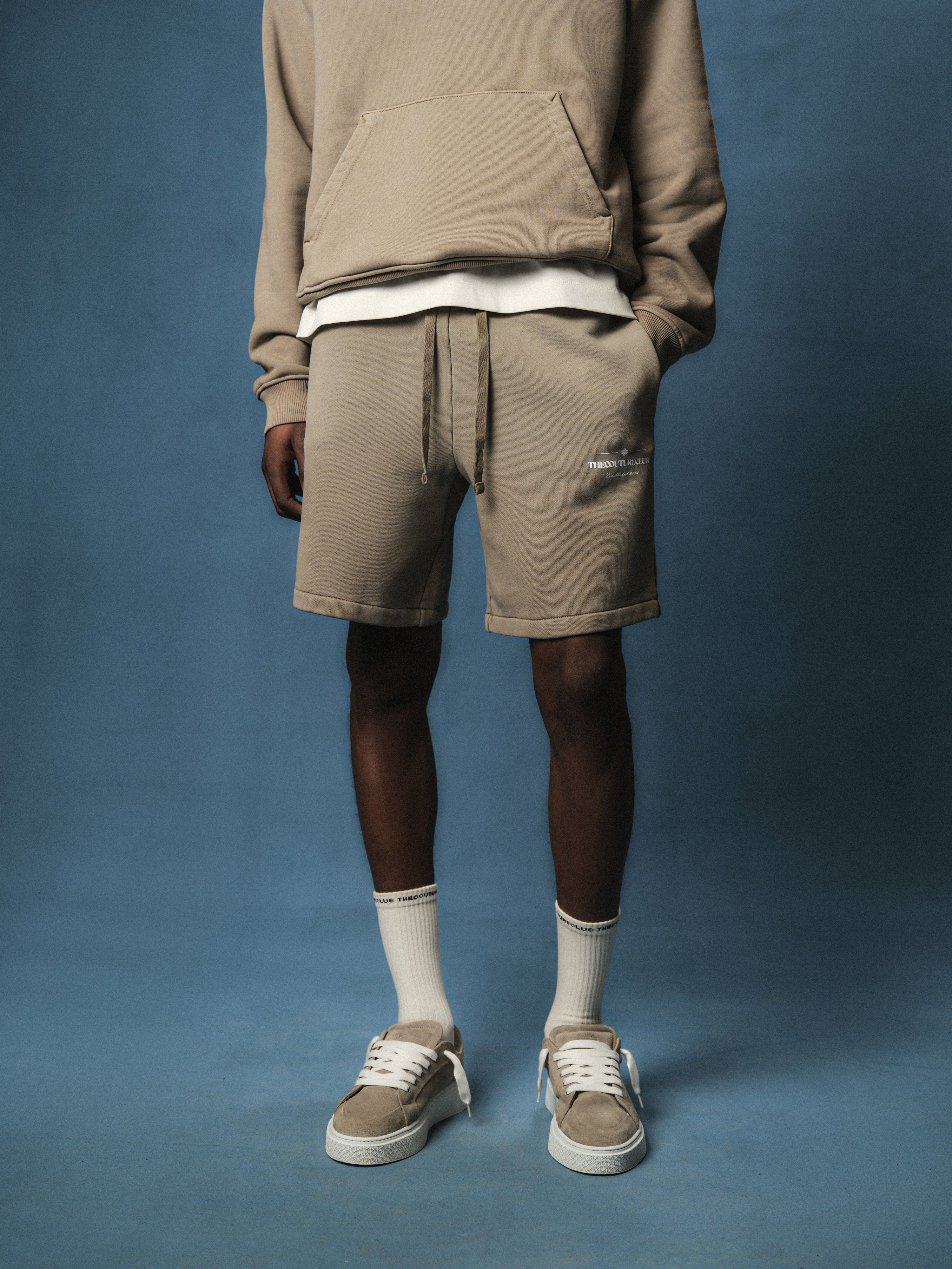 SPRAY WASH COPYRIGHT MULTI GRAPHIC SHORTS - BEIGE