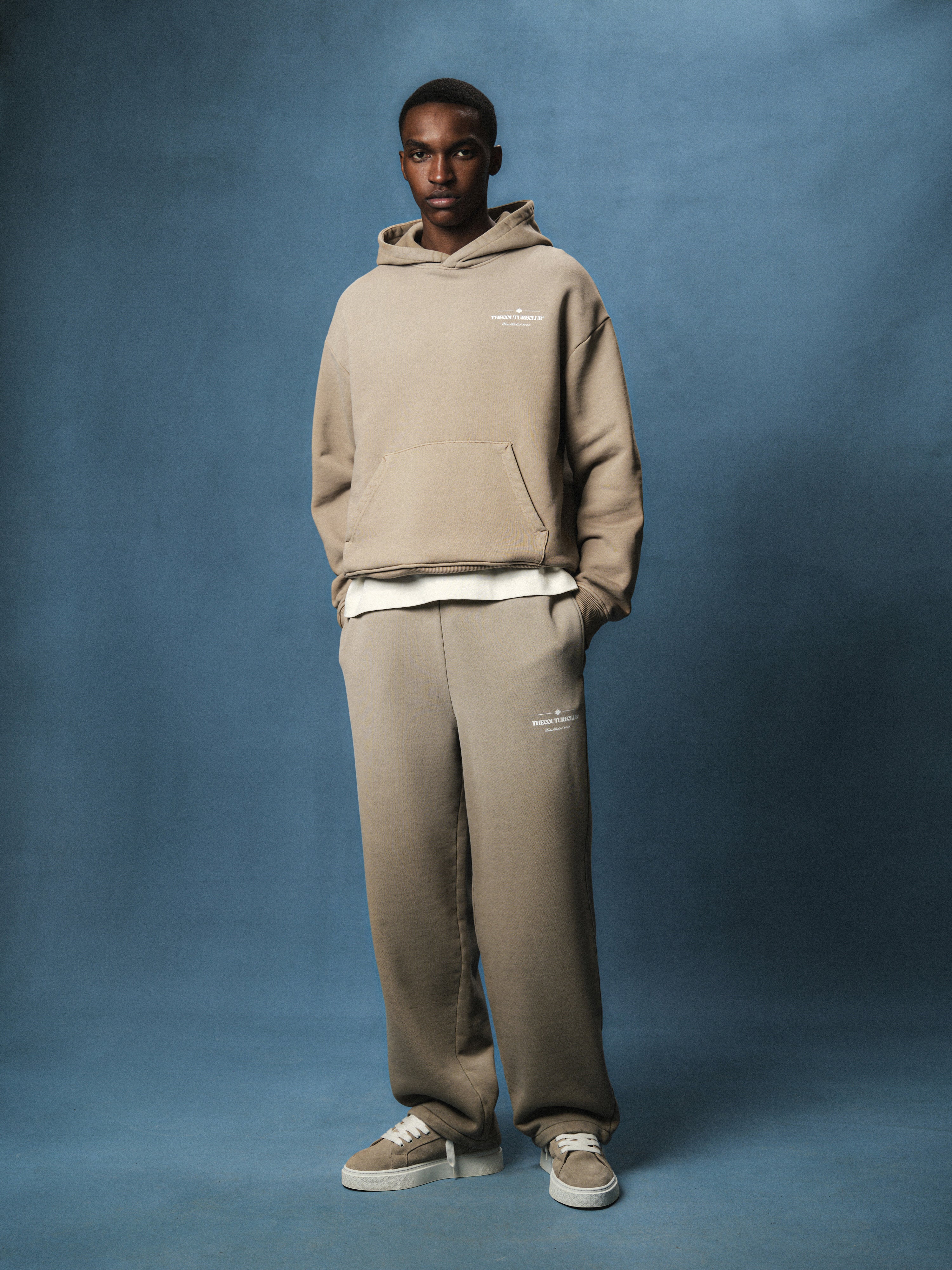 SPRAY WASH COPYRIGHT MULTI GRAPHIC JOGGERS - BEIGE