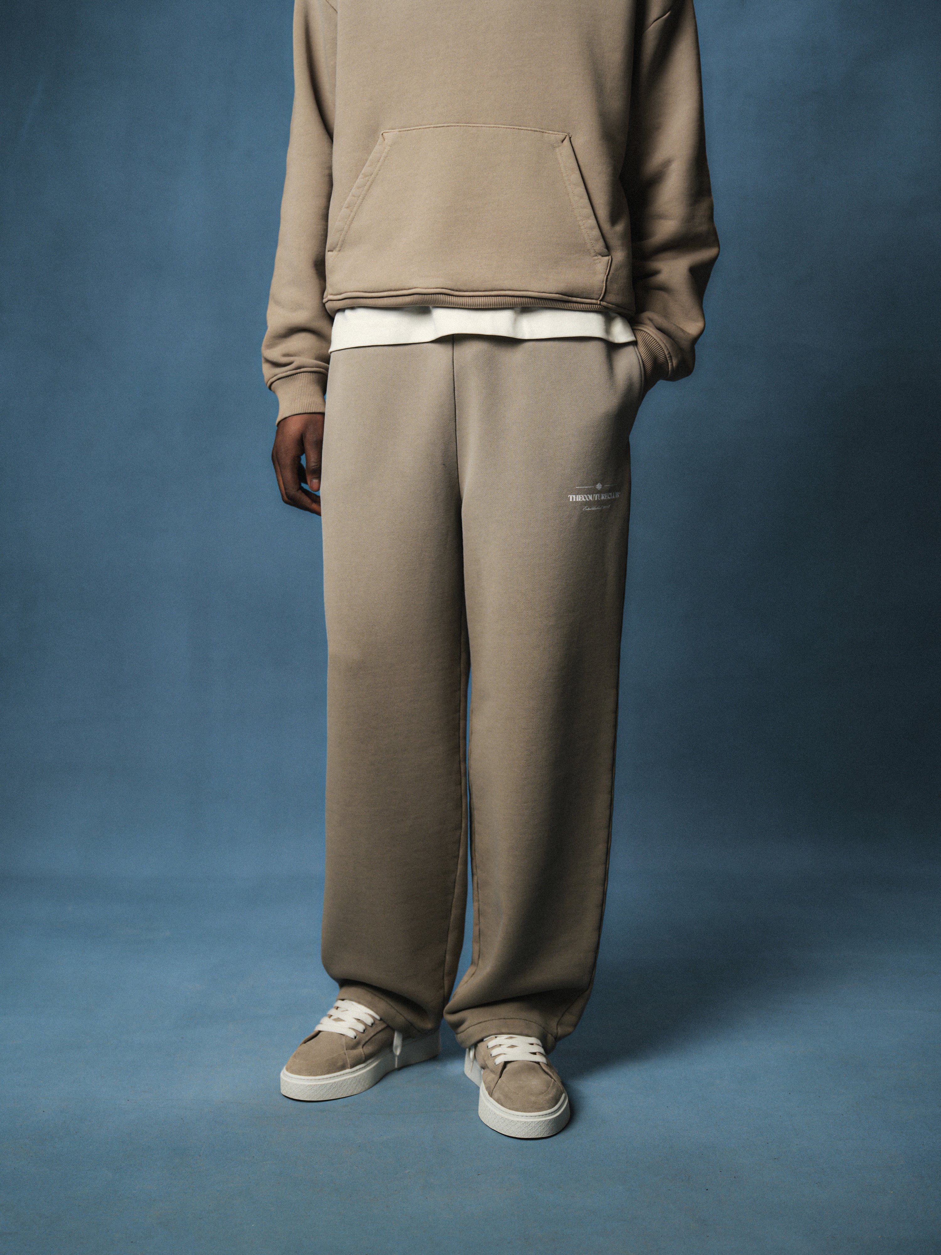 SPRAY WASH COPYRIGHT MULTI GRAPHIC JOGGERS - BEIGE