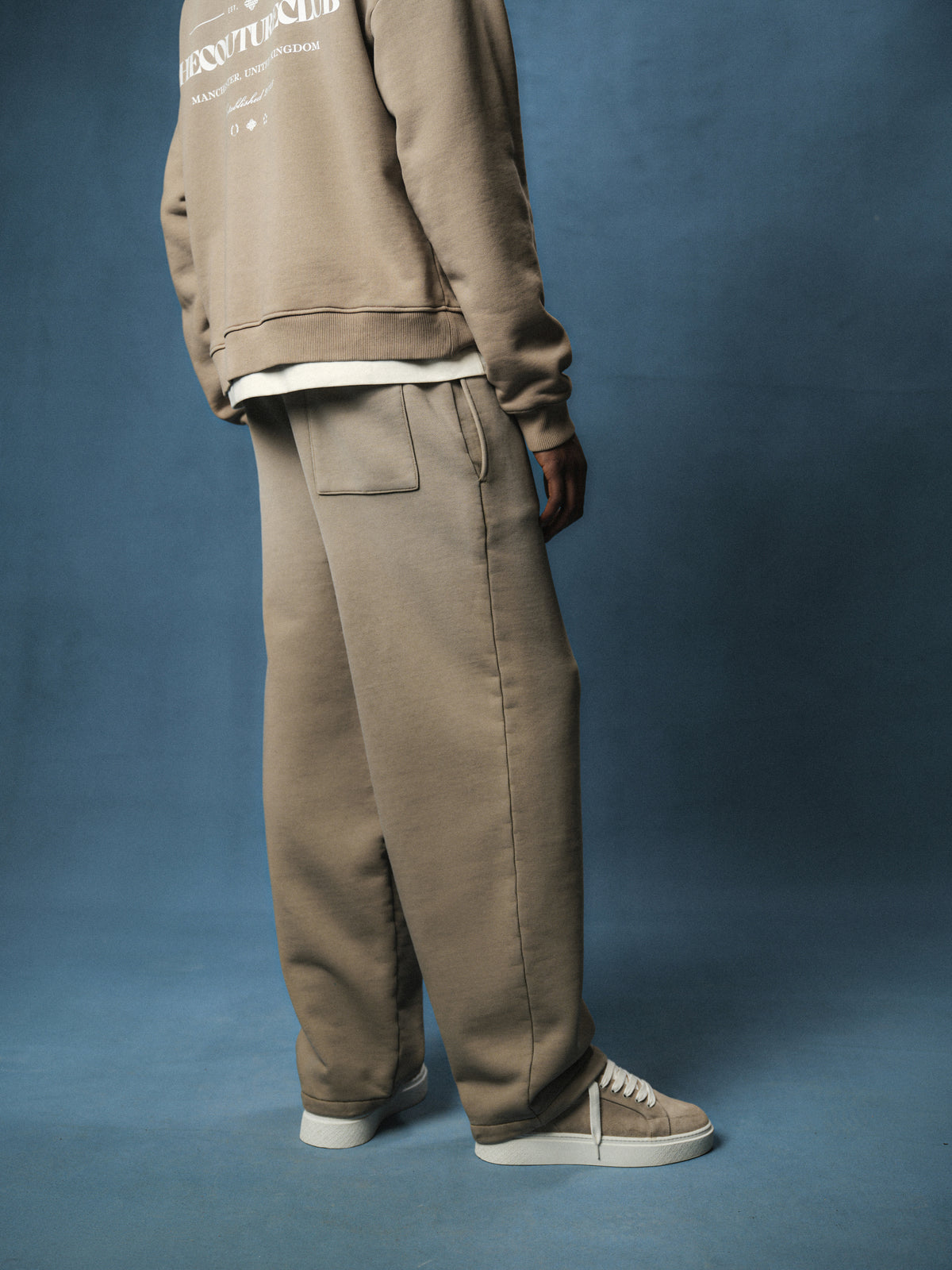 SPRAY WASH COPYRIGHT MULTI GRAPHIC JOGGERS - BEIGE