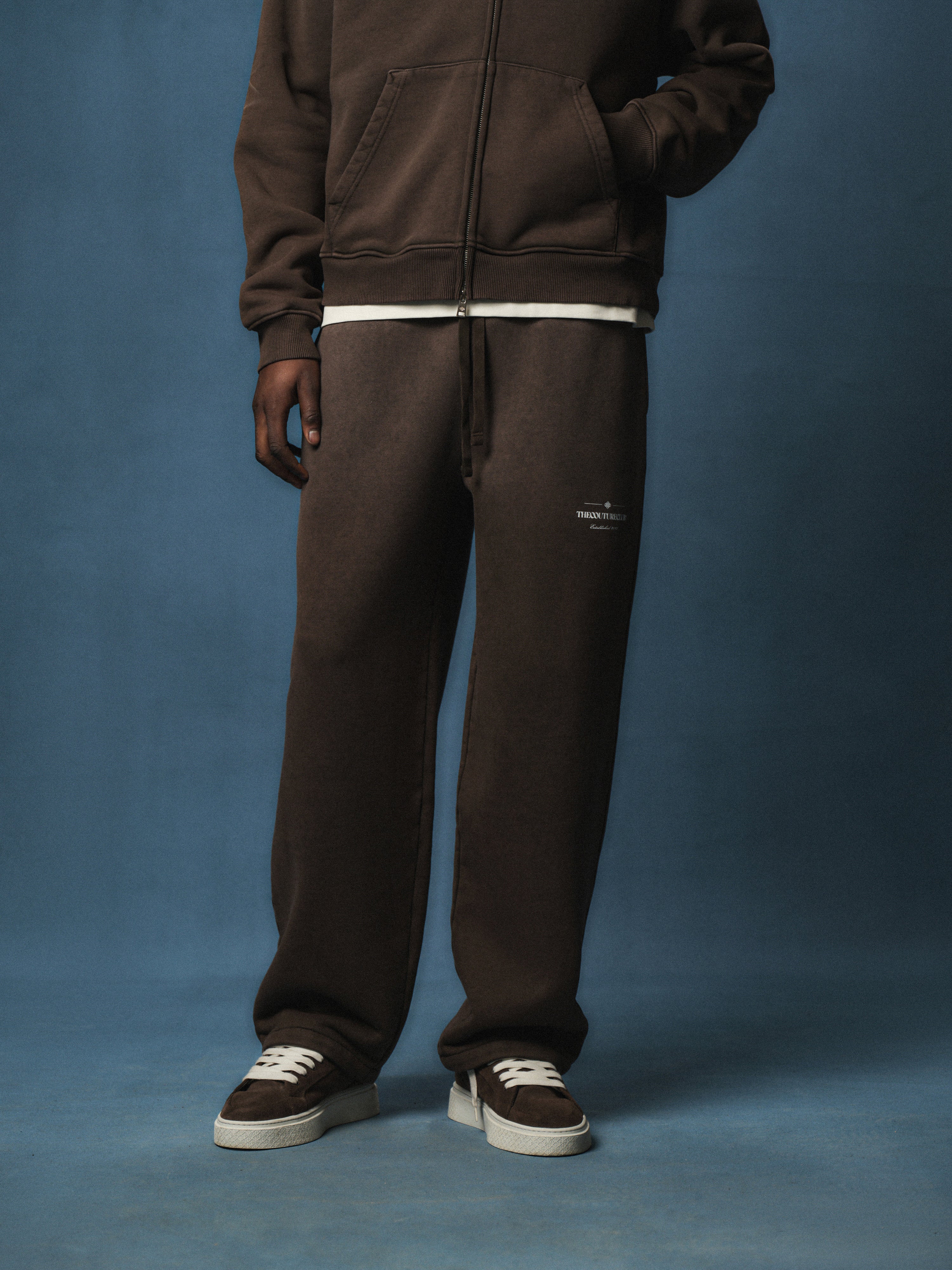 SPRAY WASH COPYRIGHT MULTI GRAPHIC JOGGERS - BROWN