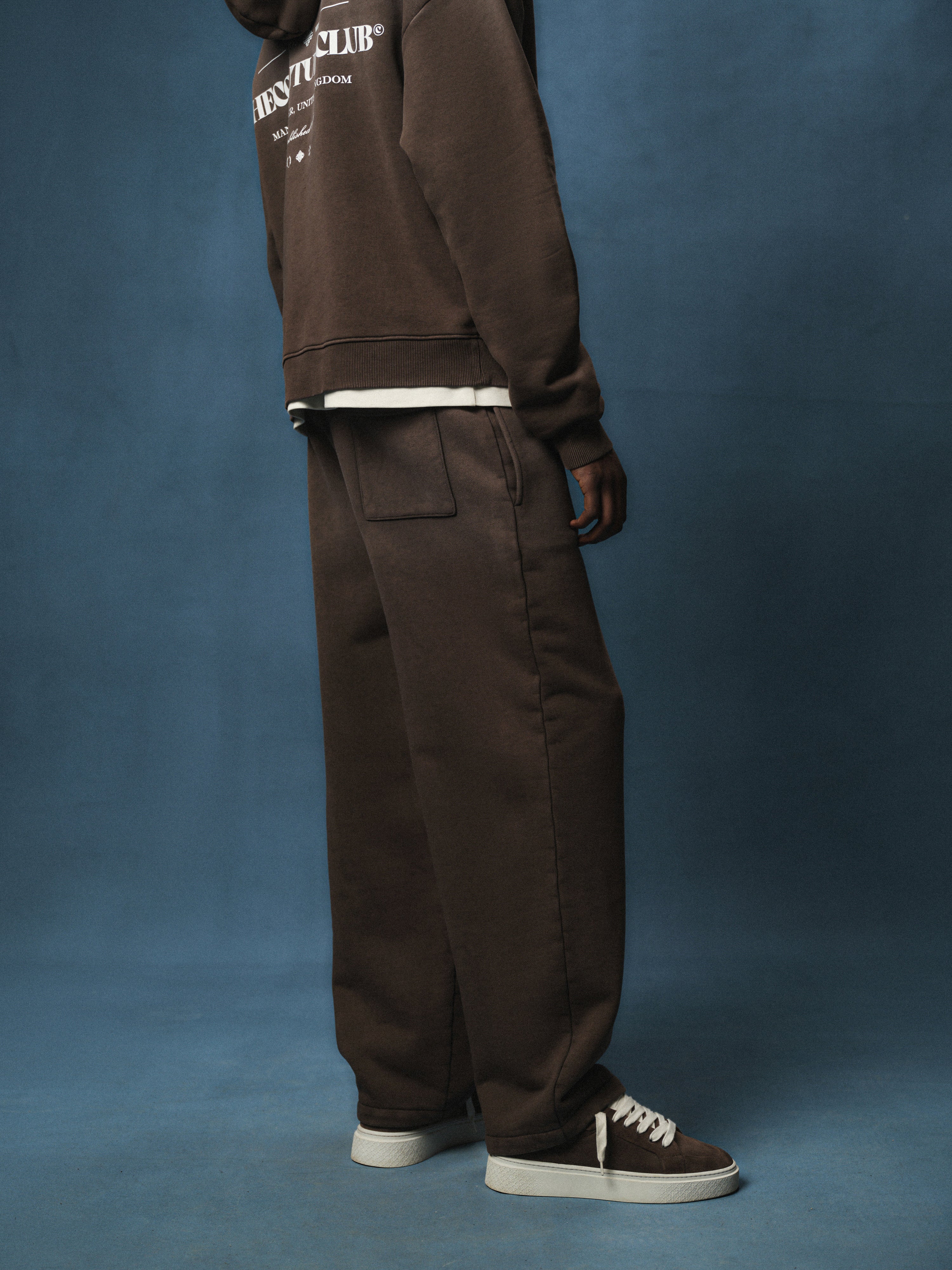 SPRAY WASH COPYRIGHT MULTI GRAPHIC JOGGERS - BROWN
