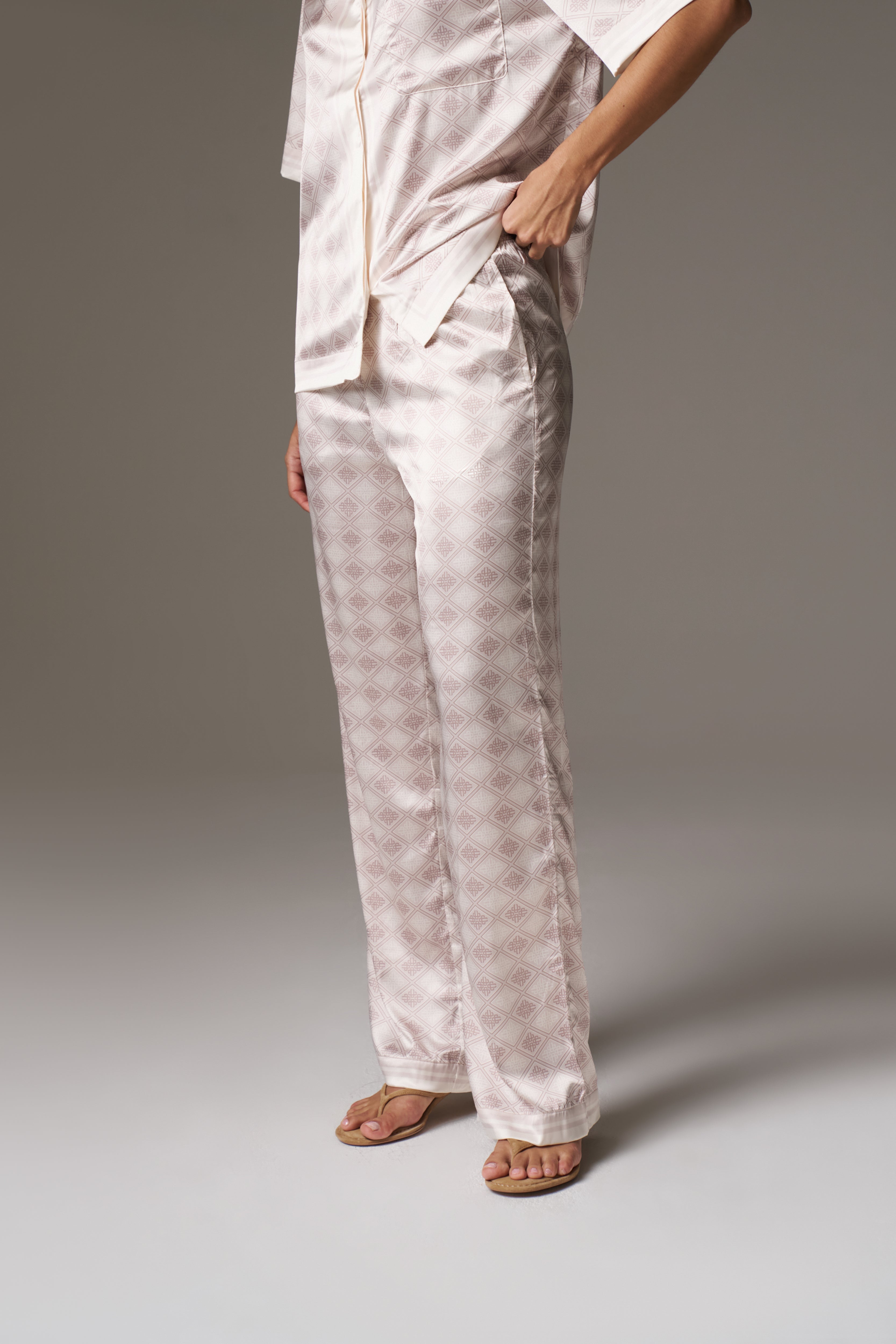 EMBLEM PRINT WIDE LEG TROUSERS - BEIGE