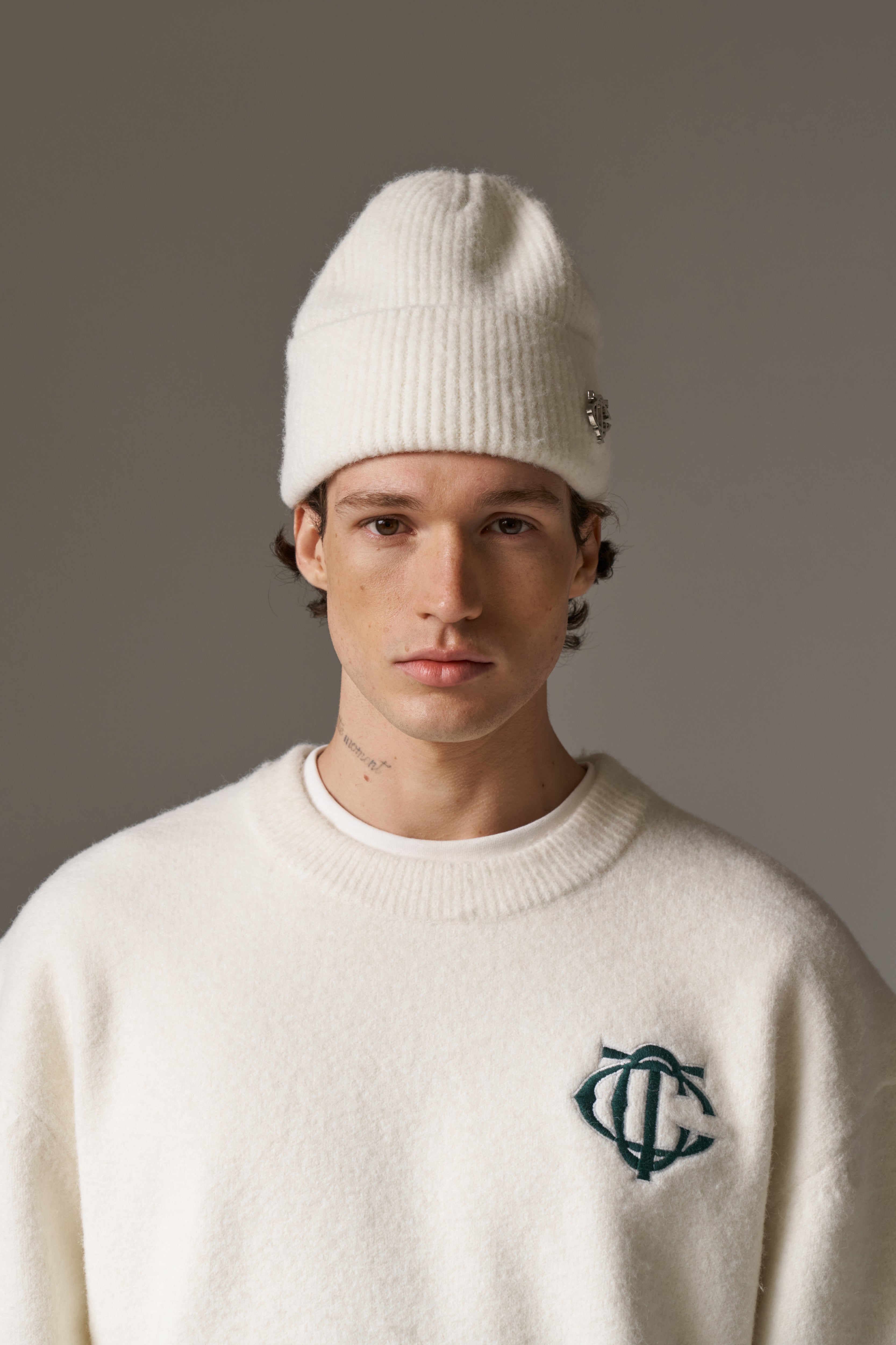 FLUFFY KNIT MONOGRAM PIN BADGE BEANIE - OFF WHITE
