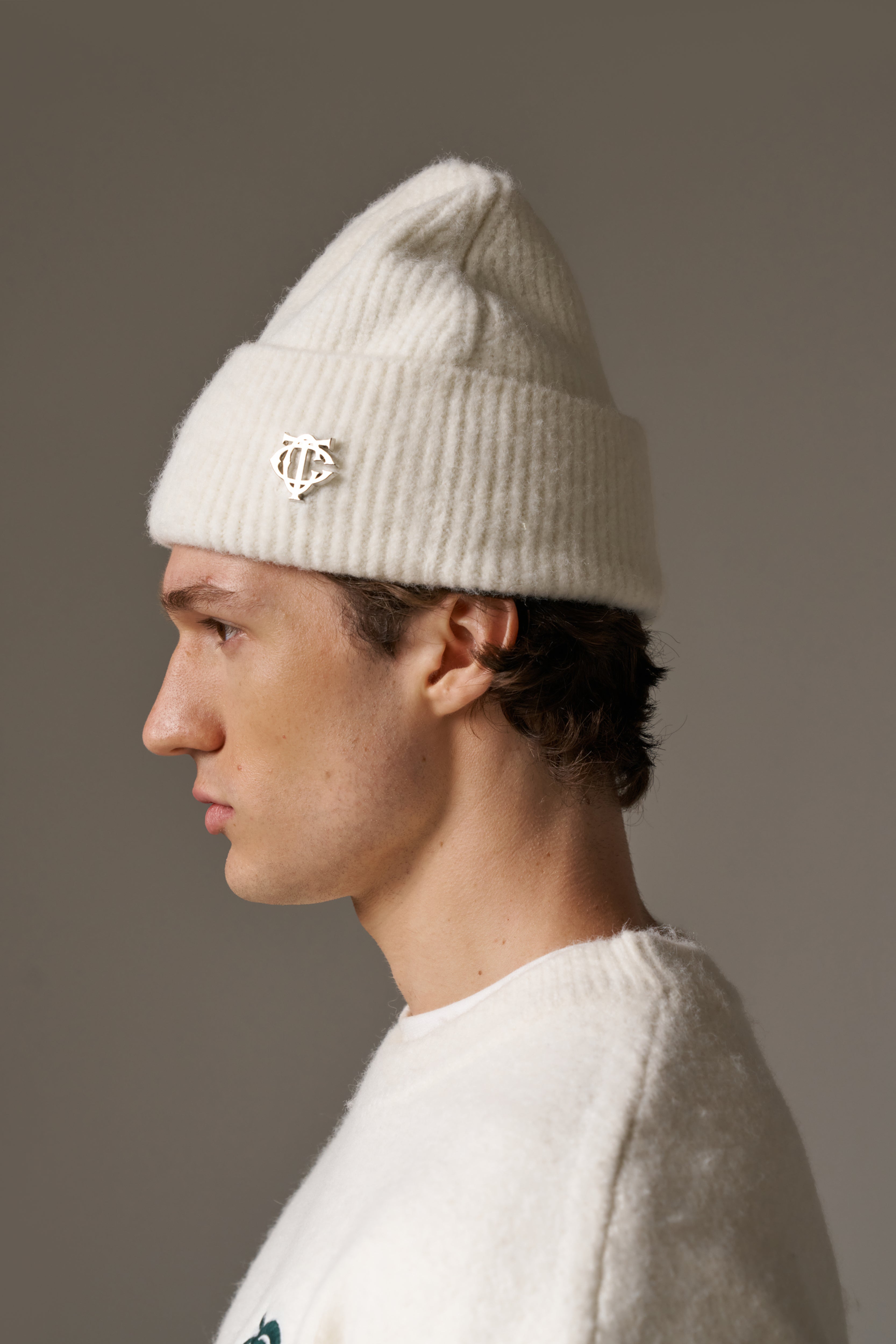 FLUFFY KNIT MONOGRAM PIN BADGE BEANIE - OFF WHITE