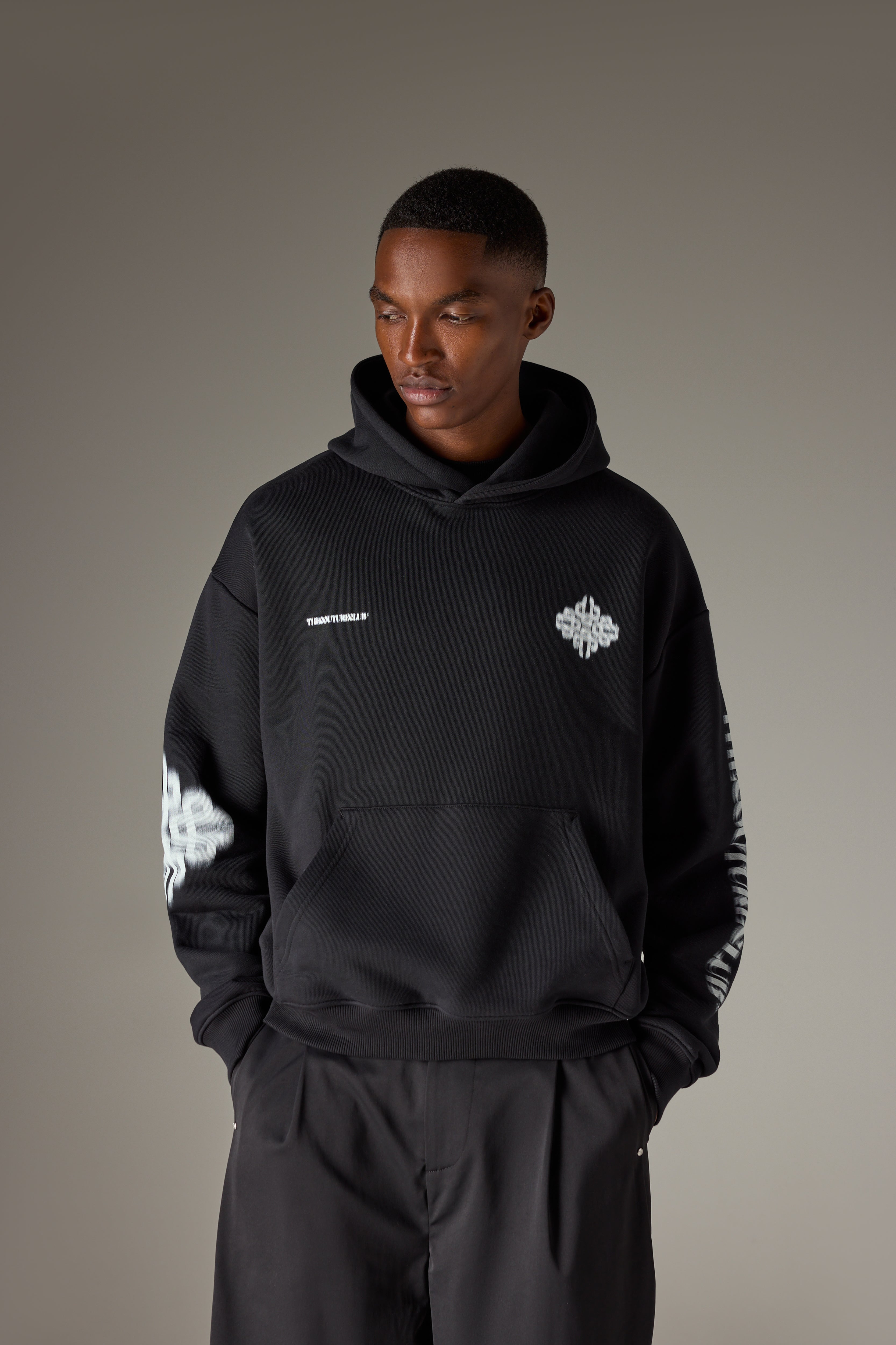 MOTION BLURRED EMBLEM HOODIE - BLACK