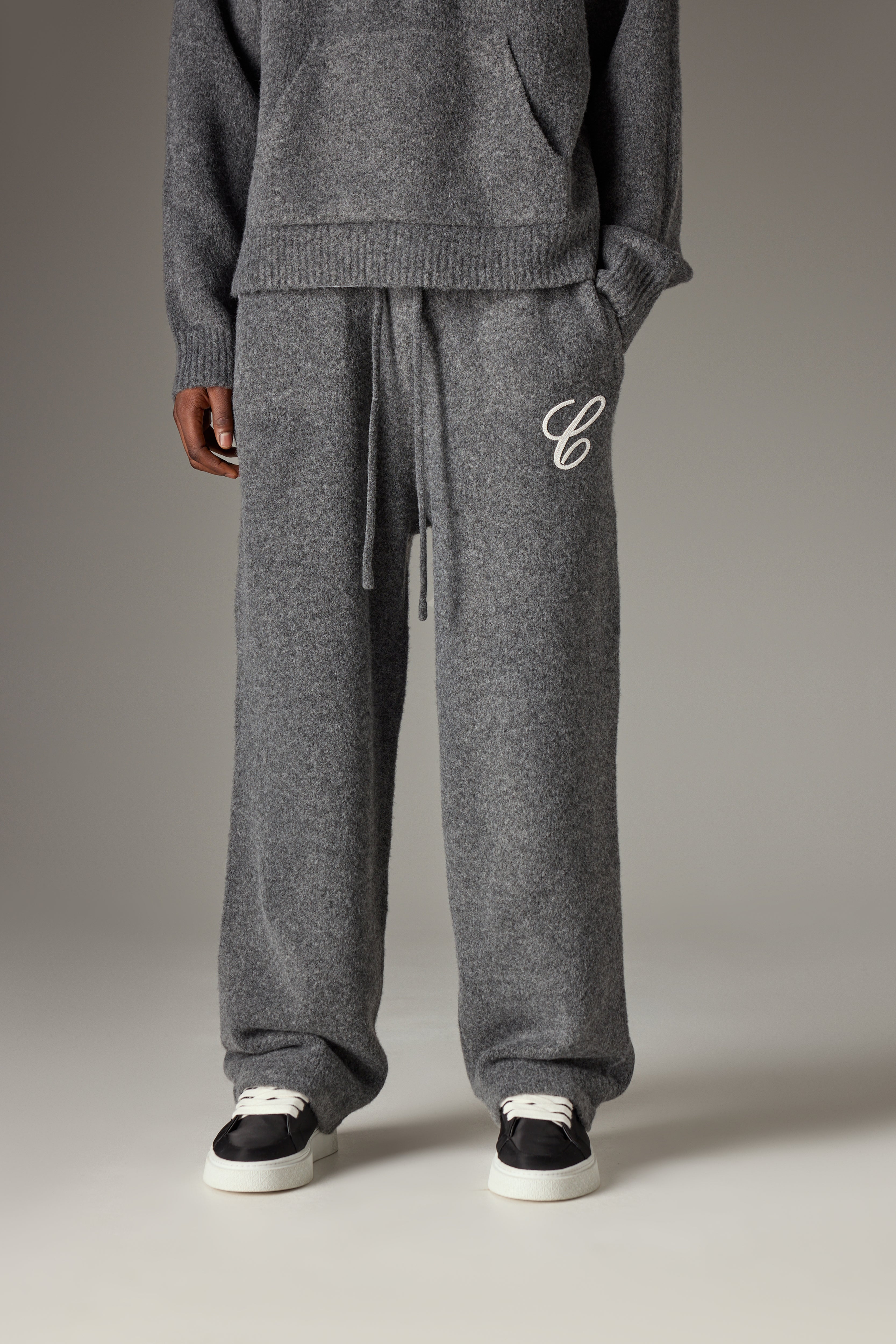 CHAINSTITCH EMBROIDERY KNITTED BARREL LEG JOGGERS - CHARCOAL