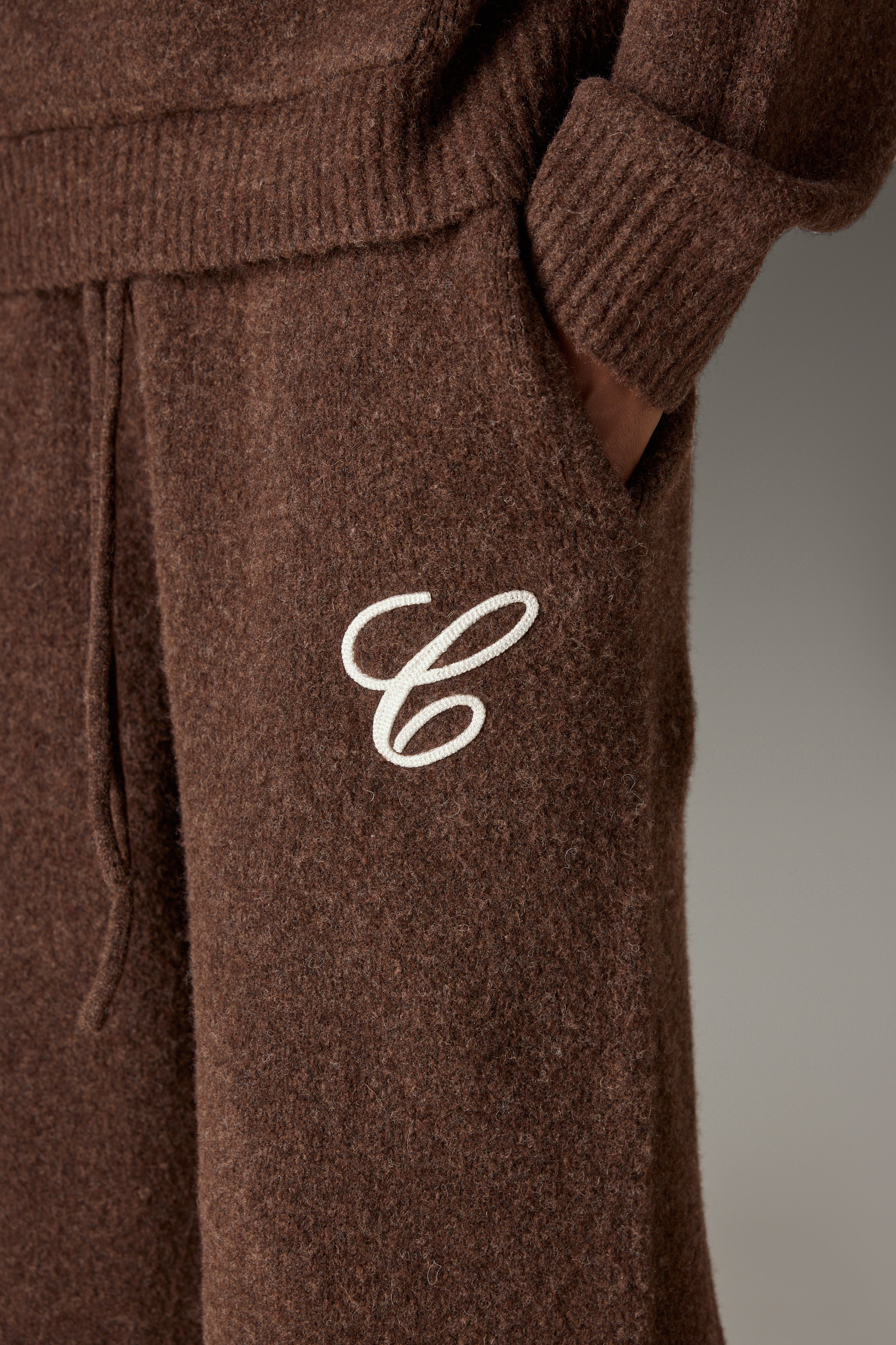 CHAINSTITCH EMBROIDERY KNITTED BARREL LEG JOGGERS - BROWN