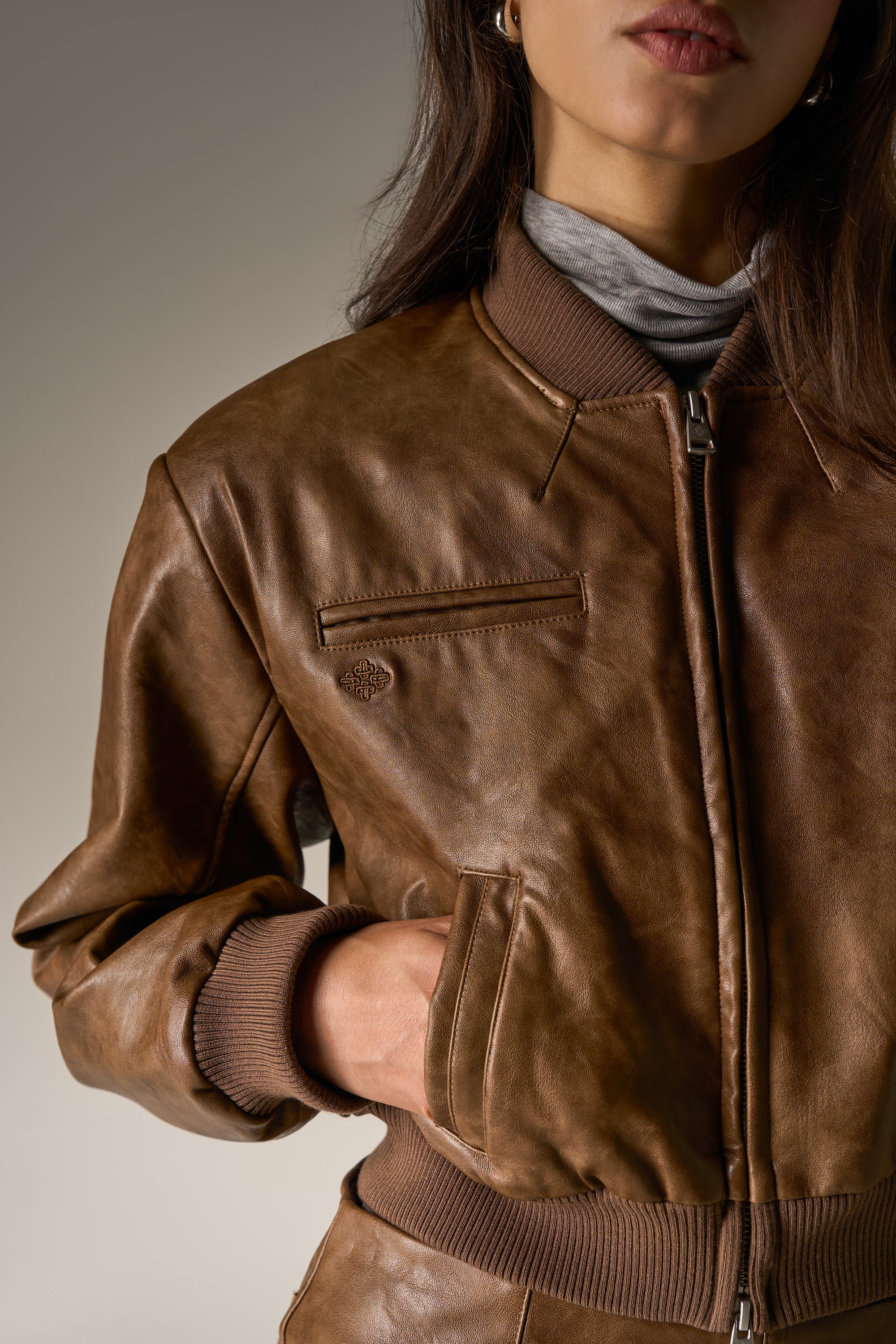 FAUX LEATHER SHOULDER PADDED BOMBER JACKET - WASHED BROWN