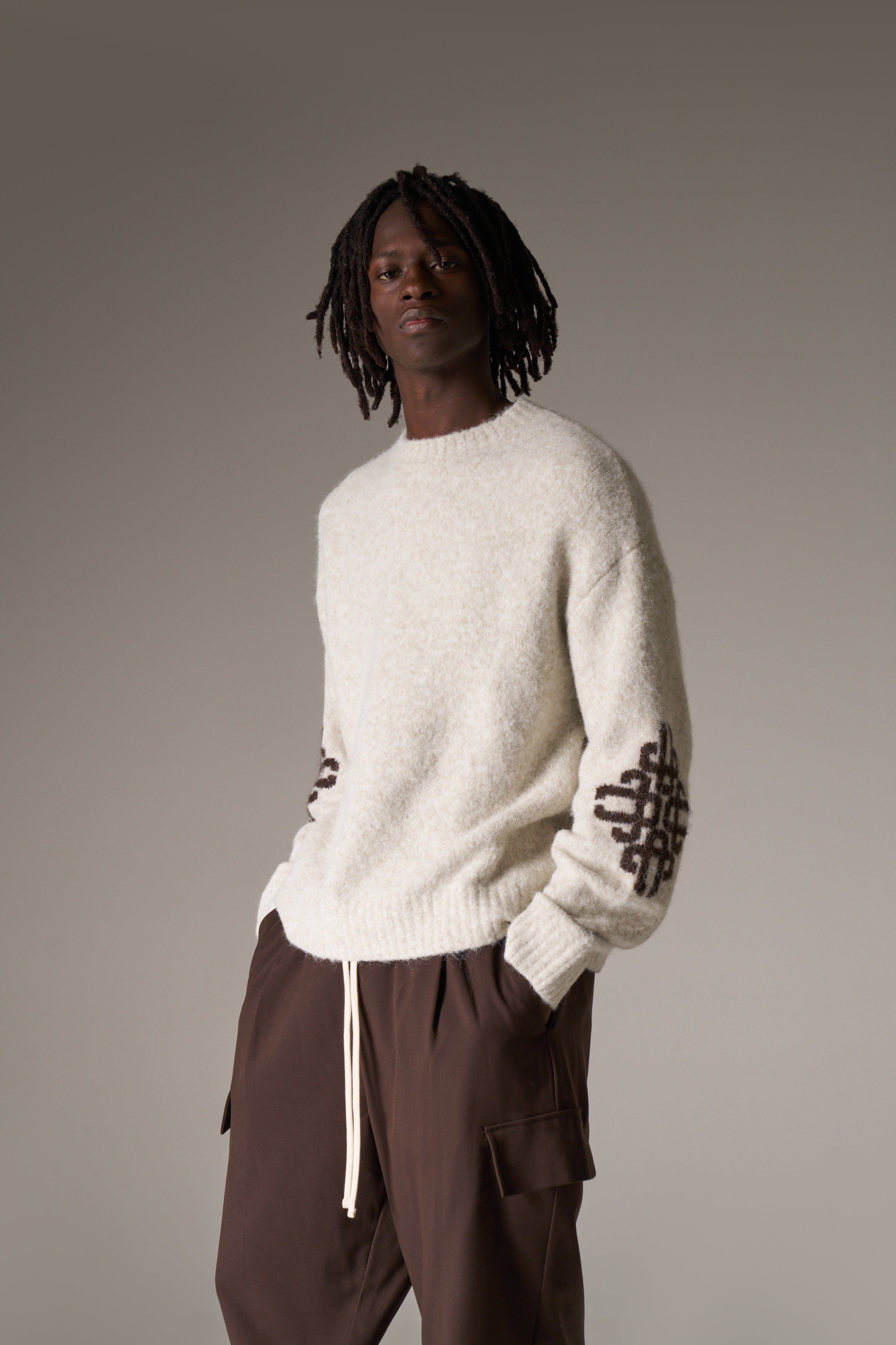 BRUSHED EMBLEM SLEEVE KNITTED CREW - BEIGE