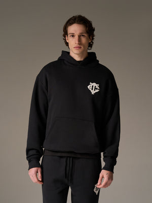 HEAVYWEIGHT MONOGRAM APPLIQUE EMBLEM HOODIE - BLACK