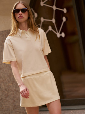 EMBLEM POLO TEE - BUTTERMILK