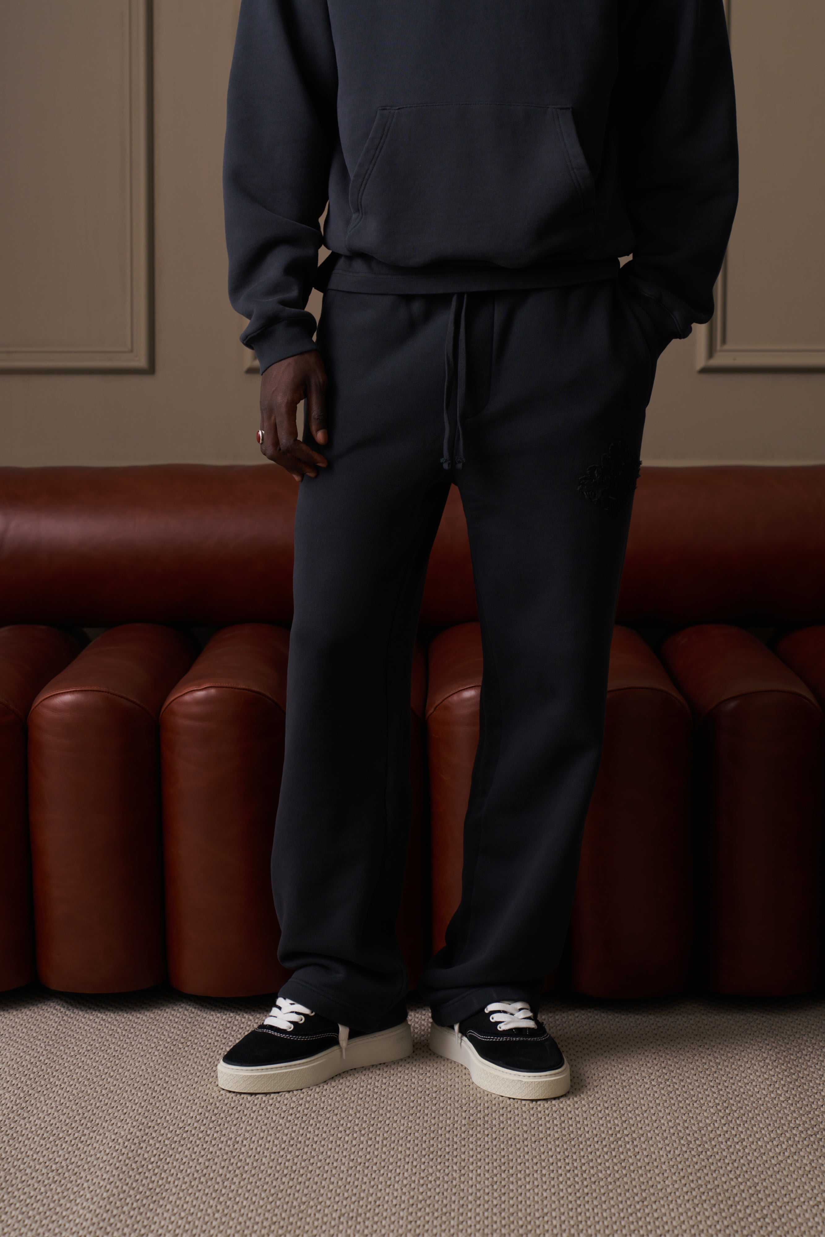 DISTRESSED EMBLEM APPLIQUE JOGGERS - BLACK