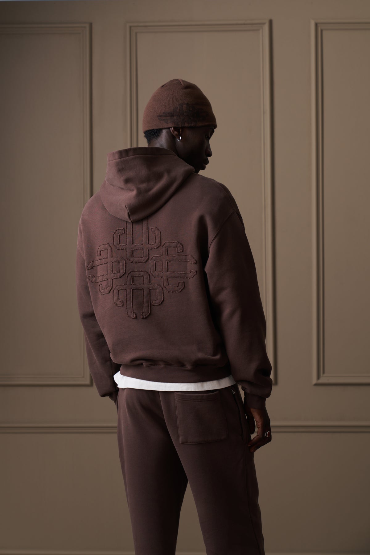 DISTRESSED EMBLEM APPLIQUE HOODIE - BROWN