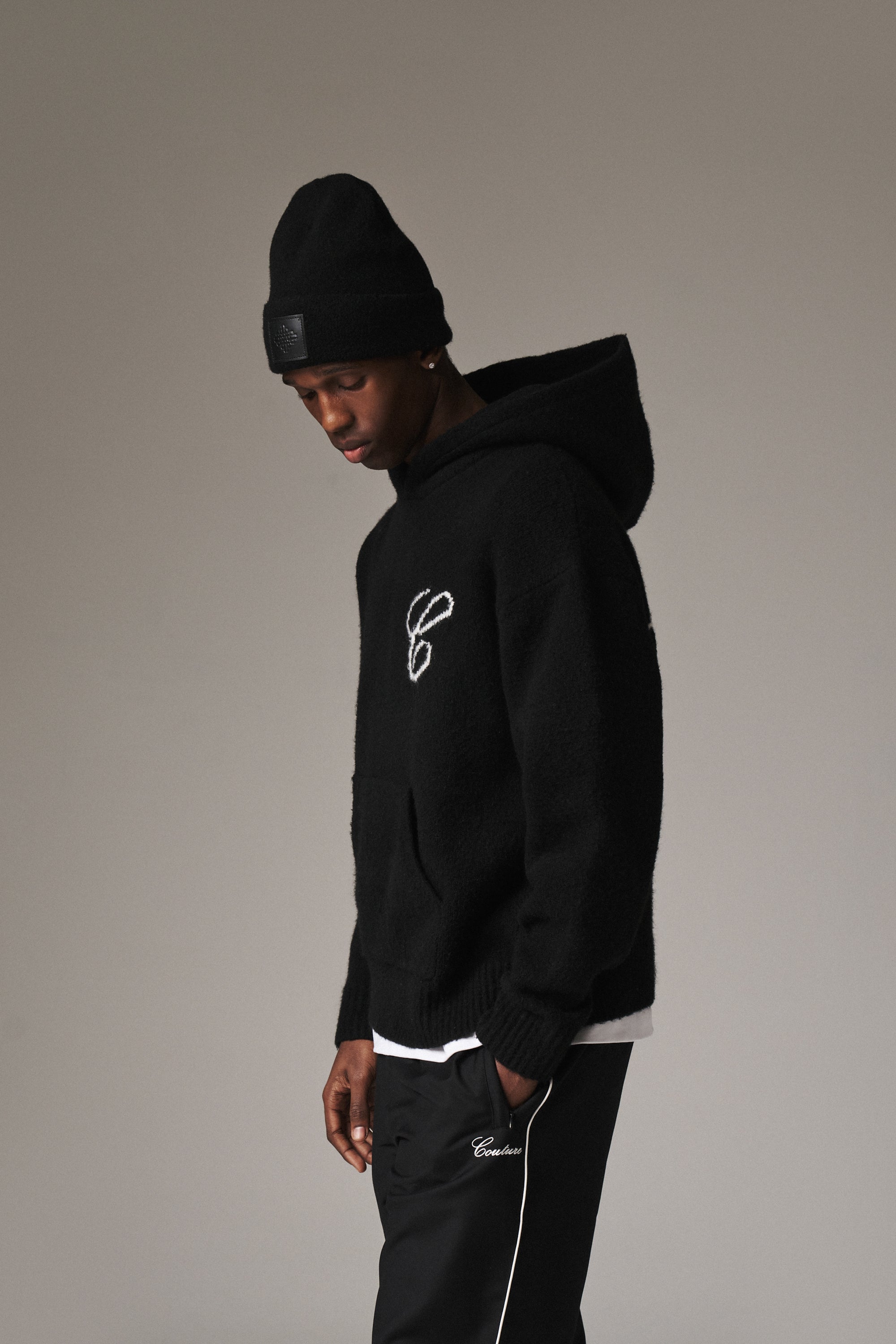 SCRIPT LOGO GRAPHIC KNITTED HOODIE - BLACK – The Couture Club