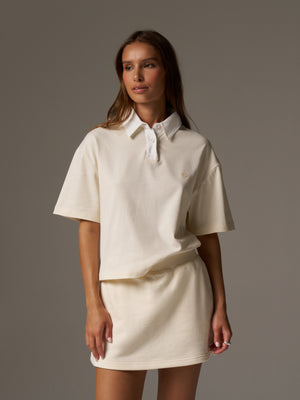 EMBLEM POLO TEE - BUTTERMILK