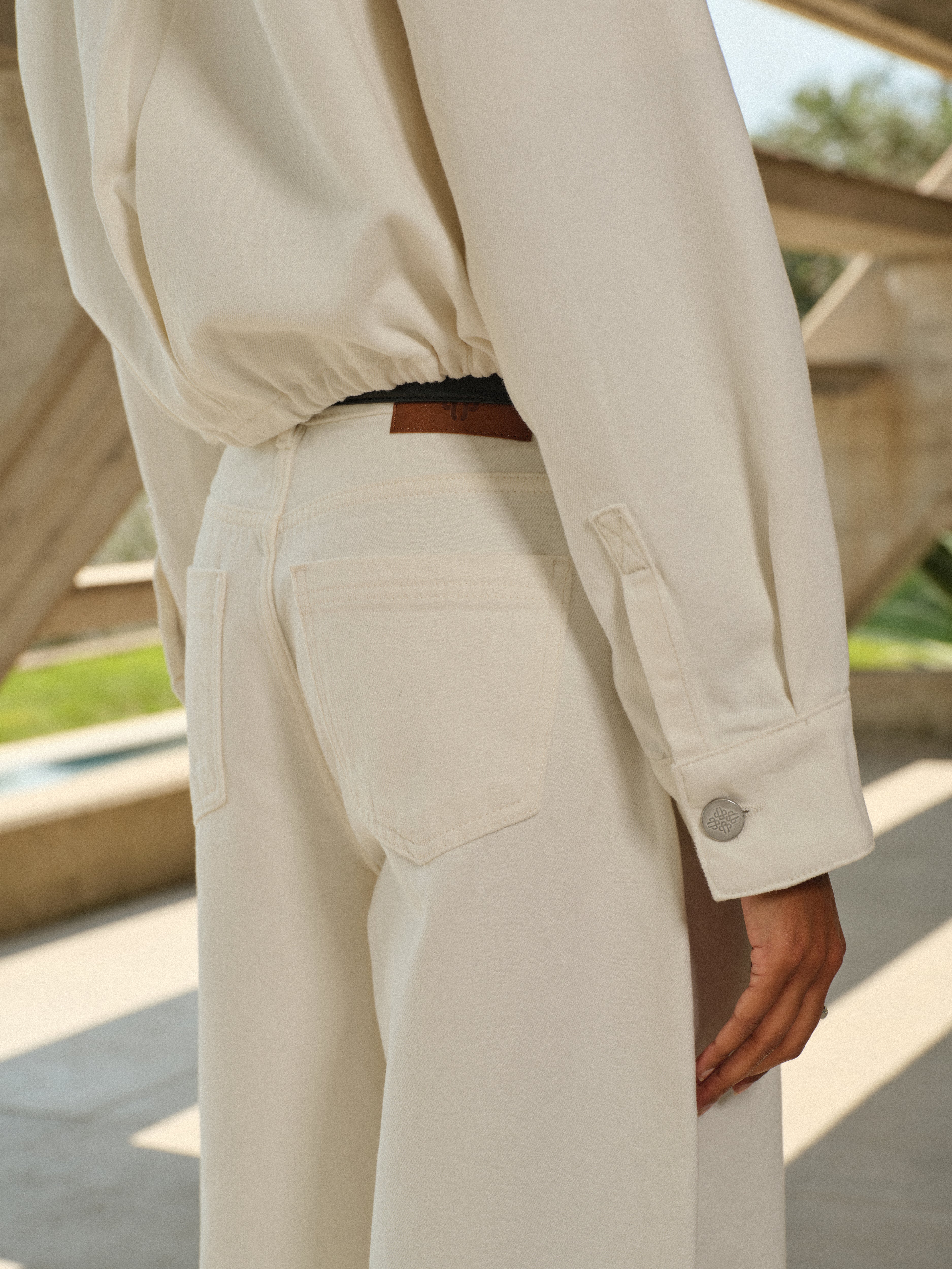 Person wearing a beige outfit